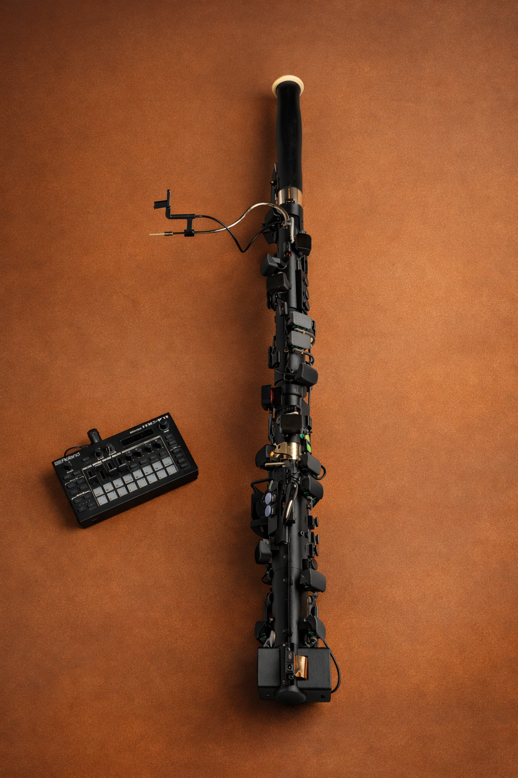 Densoon woodwind instrument photographed on amber background at Woodwind London