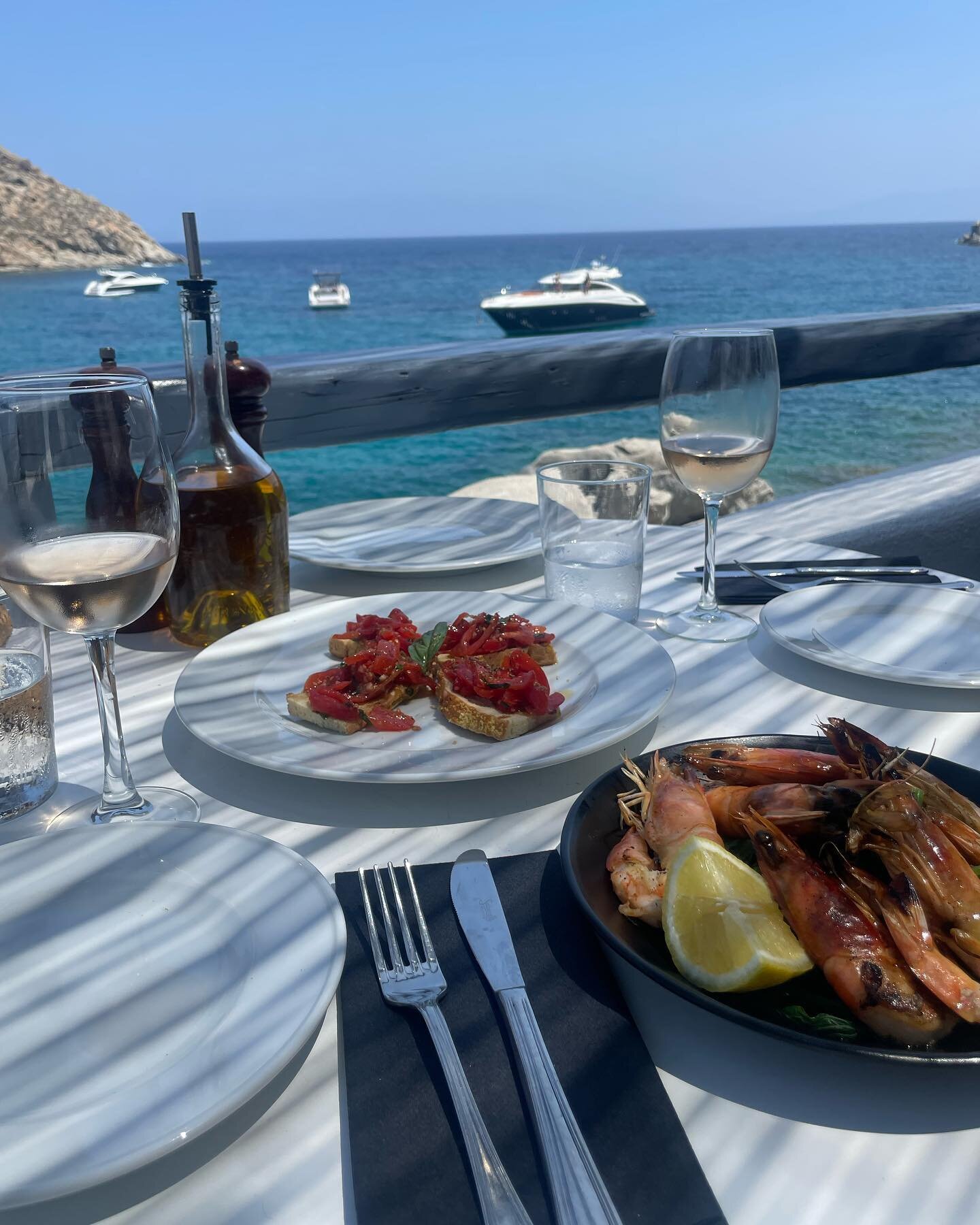 We love a long lunch with views like this and a bottle of ros&eacute;  #mykonos #spiliamykonos