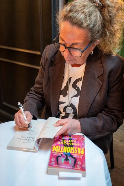 Monique Roffey signing her book Passiontide.