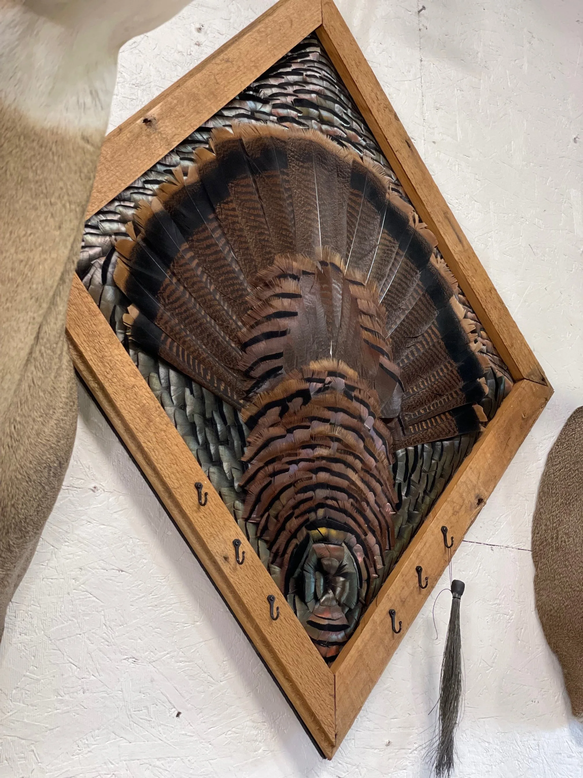 Custom Feather Art with hooks for more beards 