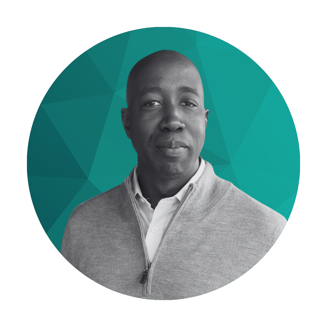 Black and white portrait of a man in a light-colored zip-up sweater and collared shirt, set against a teal geometric background.
