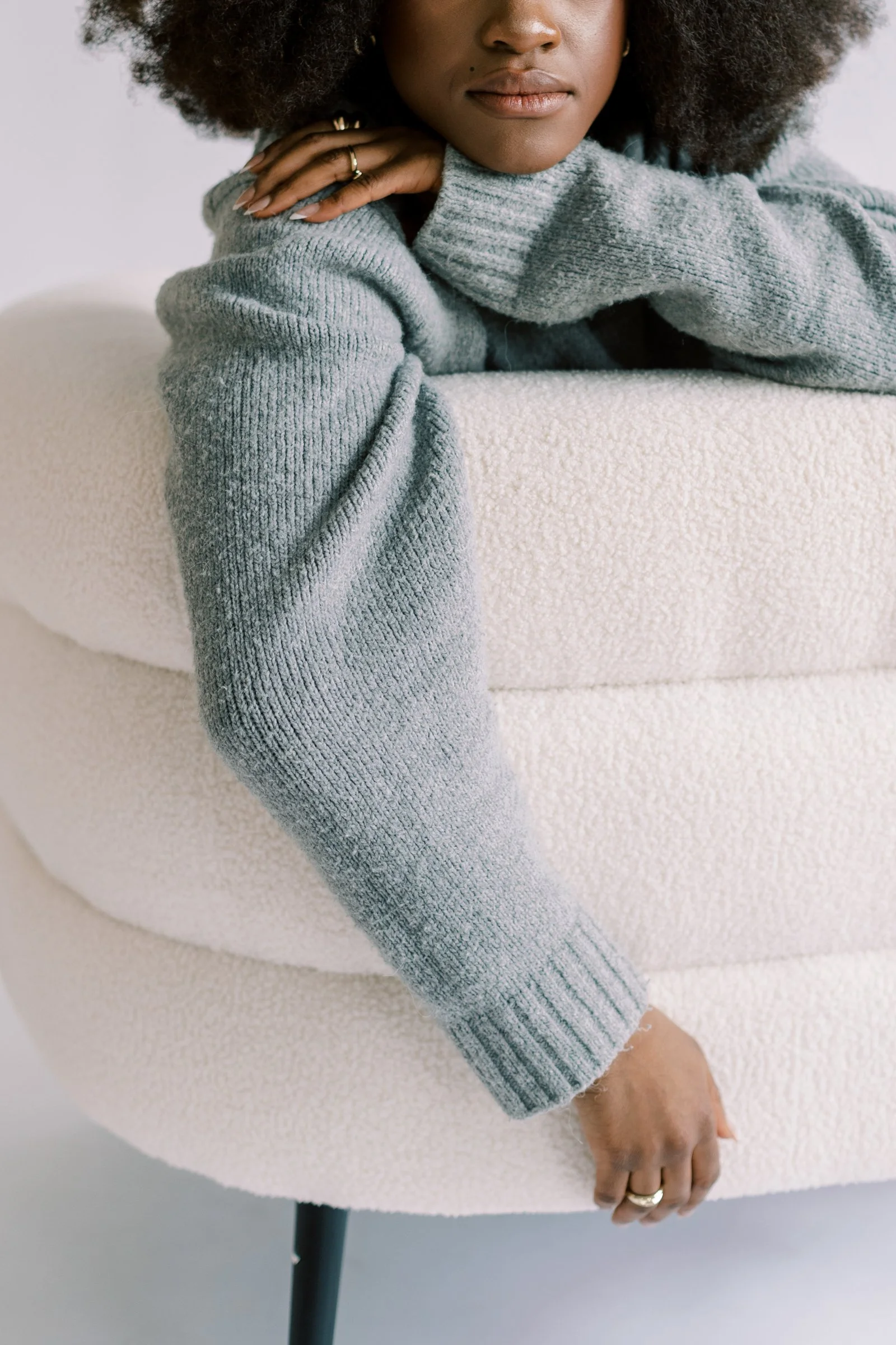 Black Woman on Chair Therapy for Dissociation in Texas is available here with an expert Dallas, TX trauma therapist.