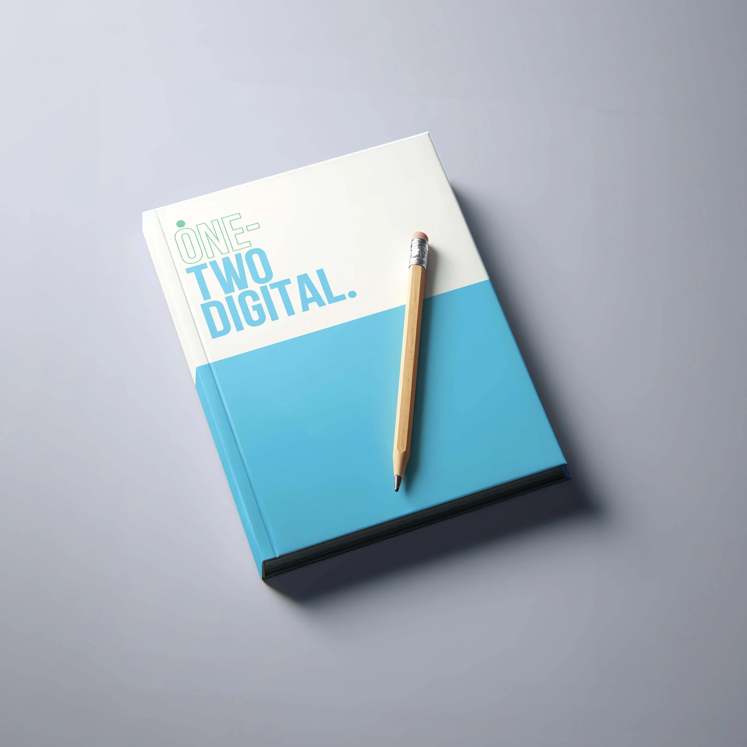 One-Two Digital branded notebook mockup showing the brand identity applied to stationery, designed by B81 Designs