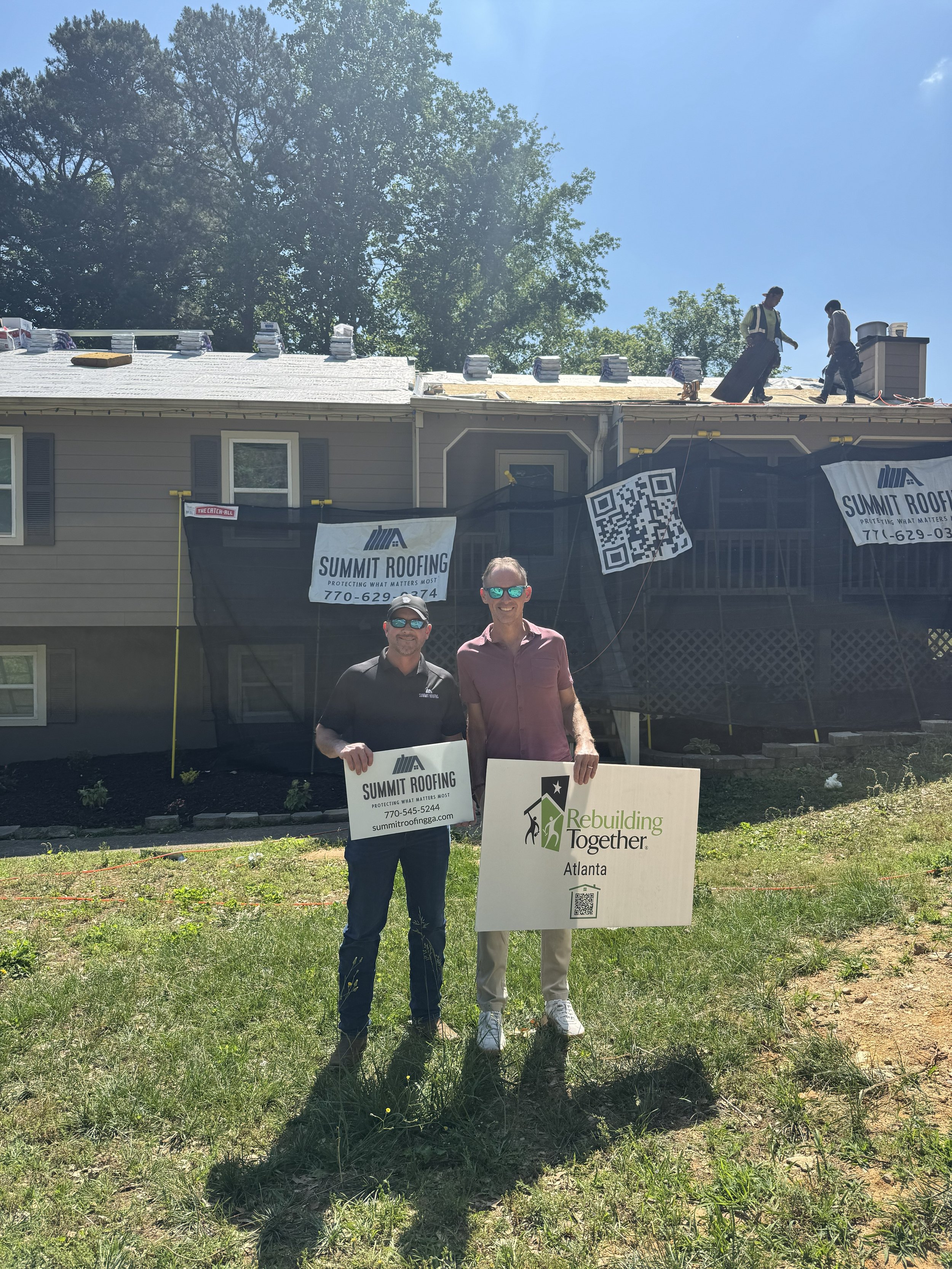 Summit Roofing Partners with Rebuilding Together Atlanta to Donate a New Roof to a Veteran Homeowner in Marietta, GA.