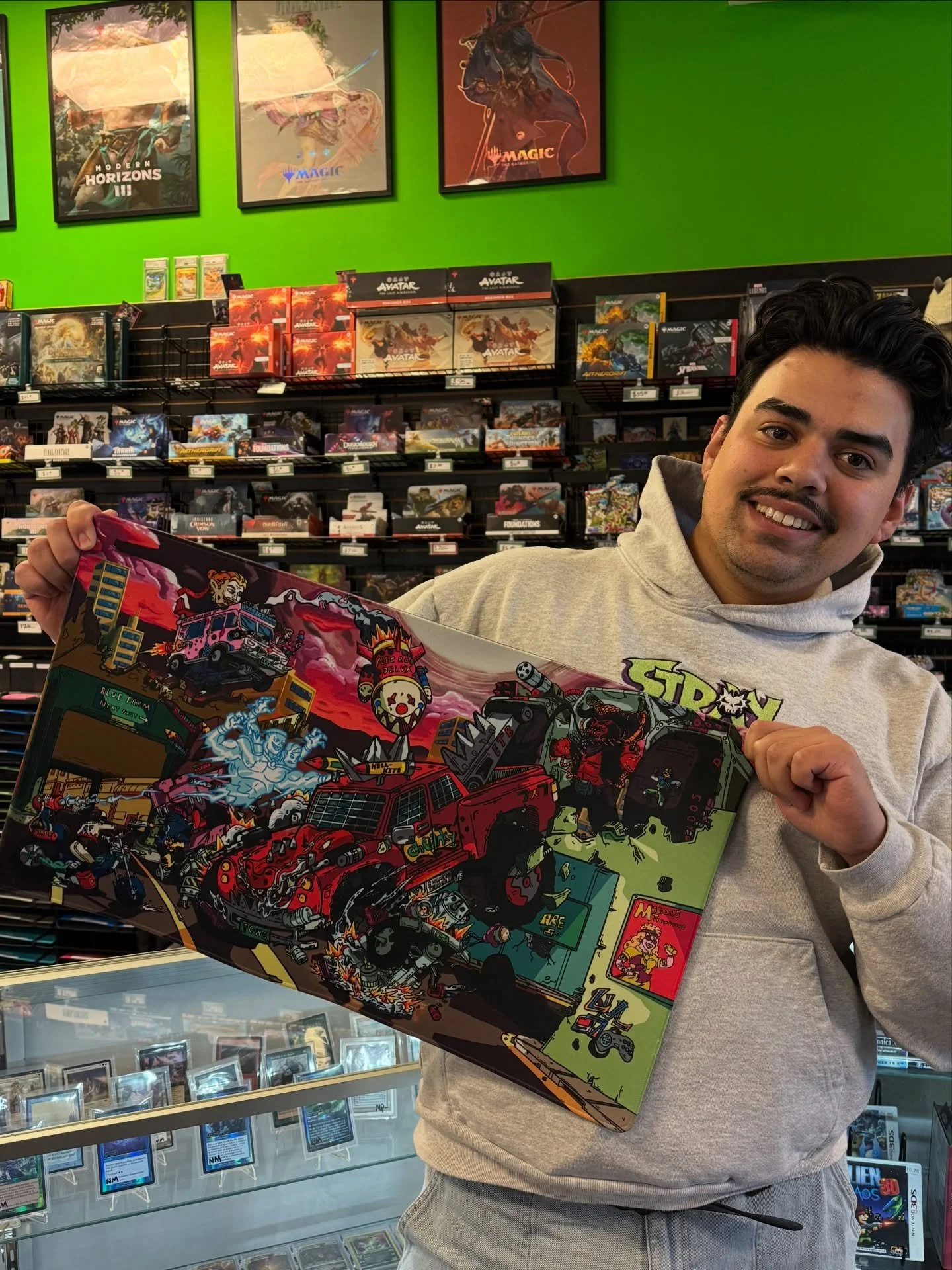🚨 New Playmat 🚨 

Fire up some Rob Zombie for this Twisted Metal X cEDH Magic design from our friend @abesartbox ! 

He fit a ton of detail and color into this one! Which is your favorite reference from either universe?

$25 only at Level 7 Games


