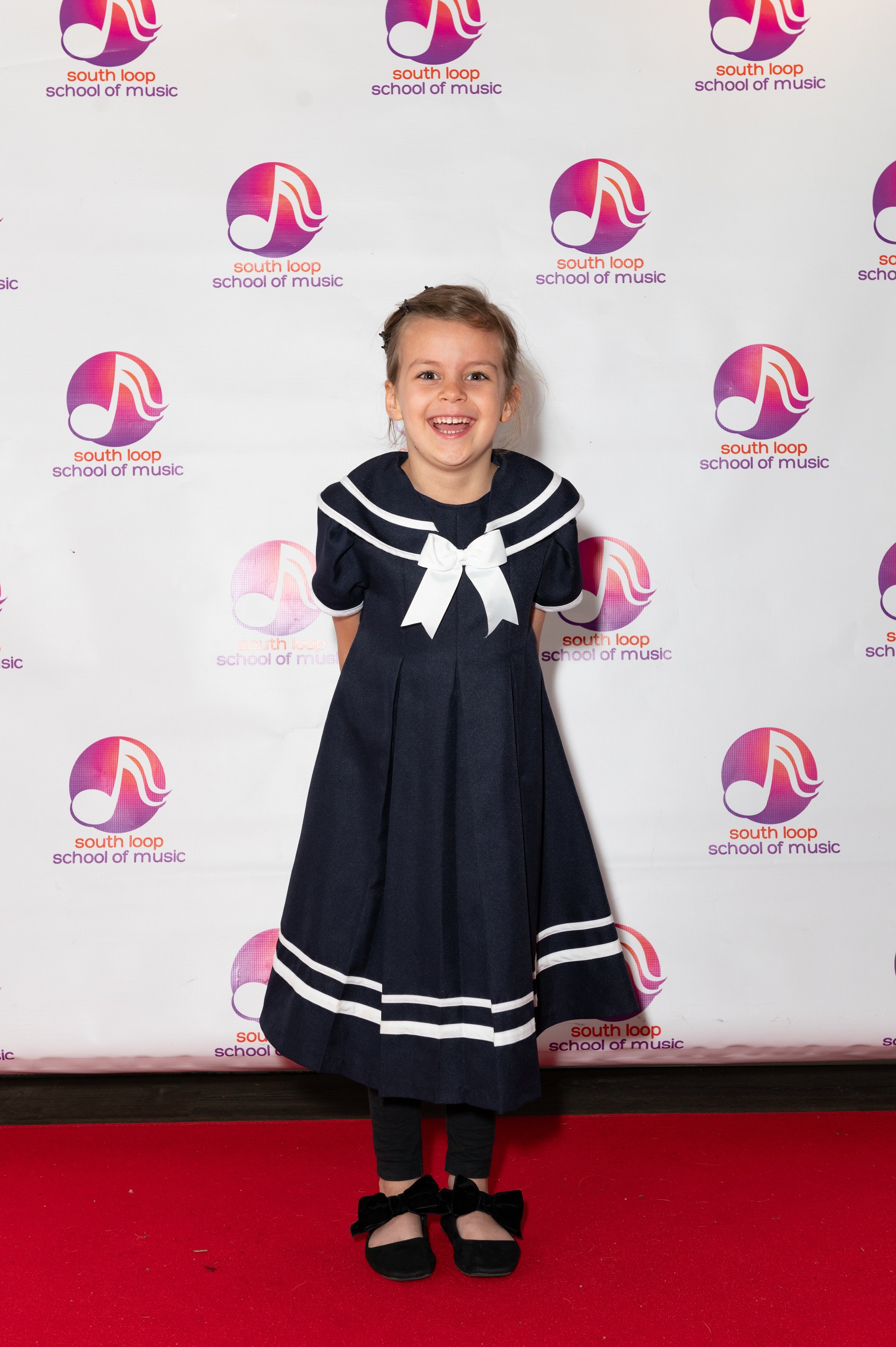 Excitement is clear for this little girl leading up to the Summer Recital