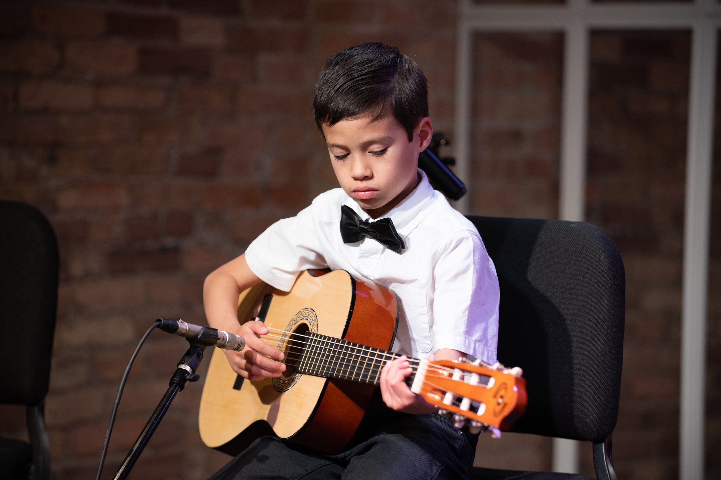 We love when we are treated to a guitar performance at the Summer Recital