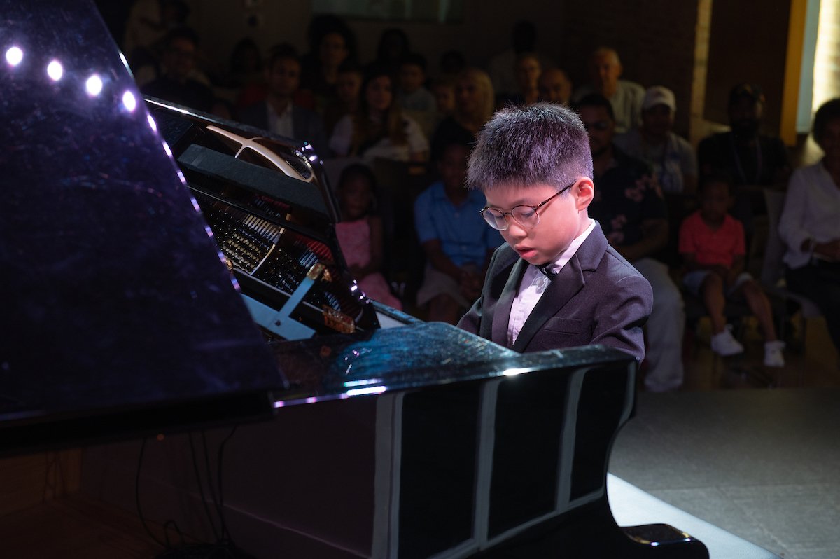 Rafael performing at the South Loop School of Music winter recital 2023