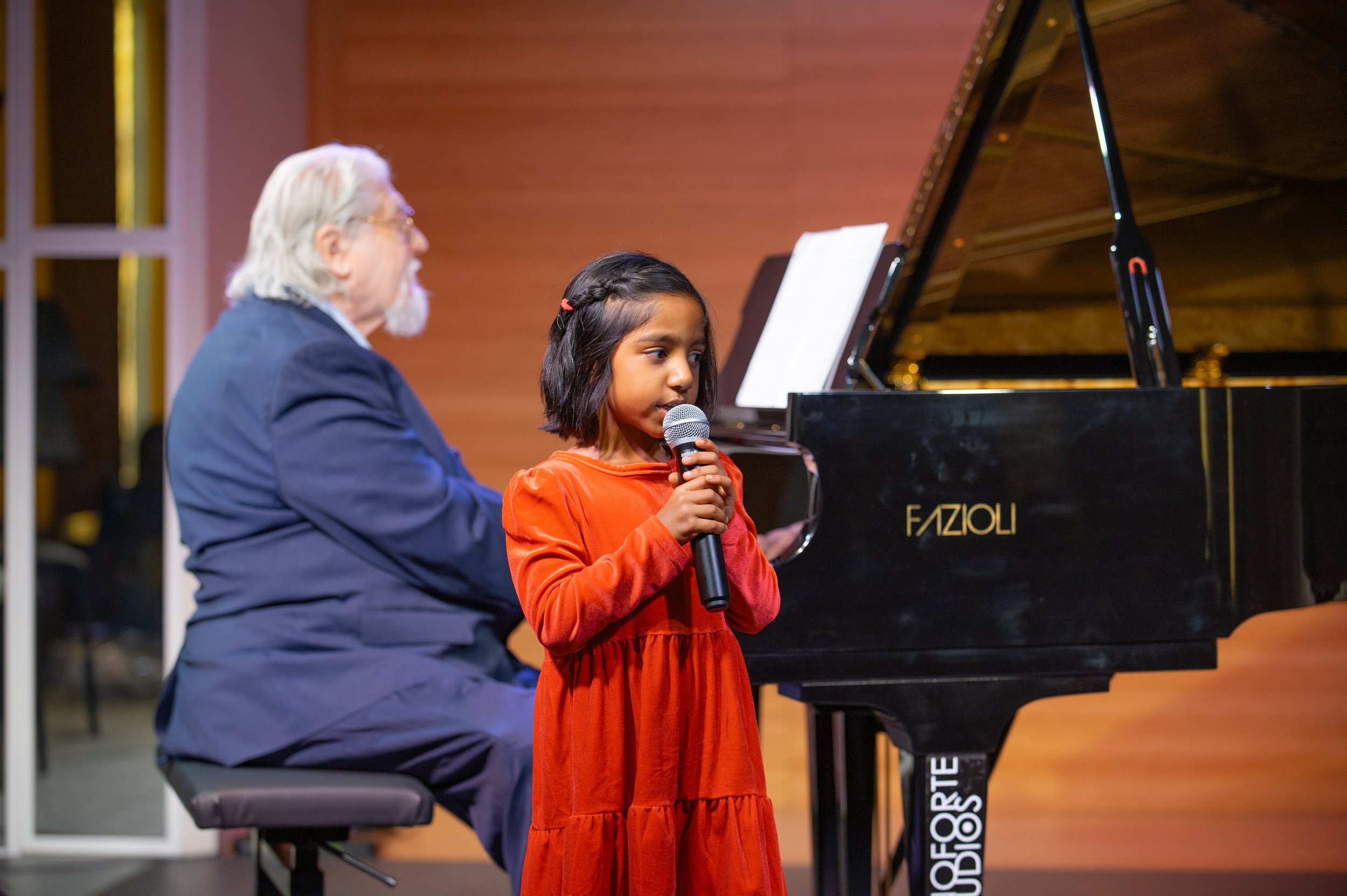 Anika sharing the stage with her collaborative pianist