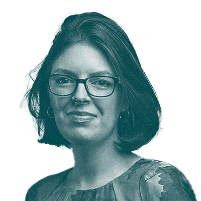grainy navy monochrome photo of Dr. Myka Estes. She has short dark hair and is wearing black glasses.