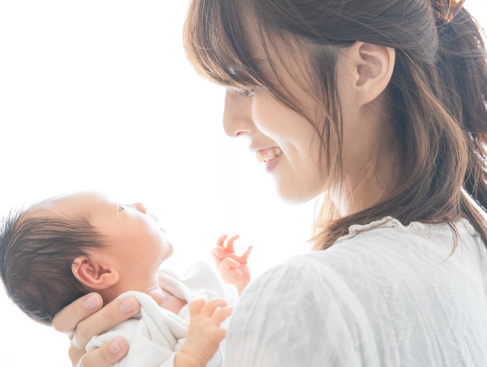 image of mother looking into her infant's eyes and bonding emotionally at babyspace coachella valley in palm desert, ca