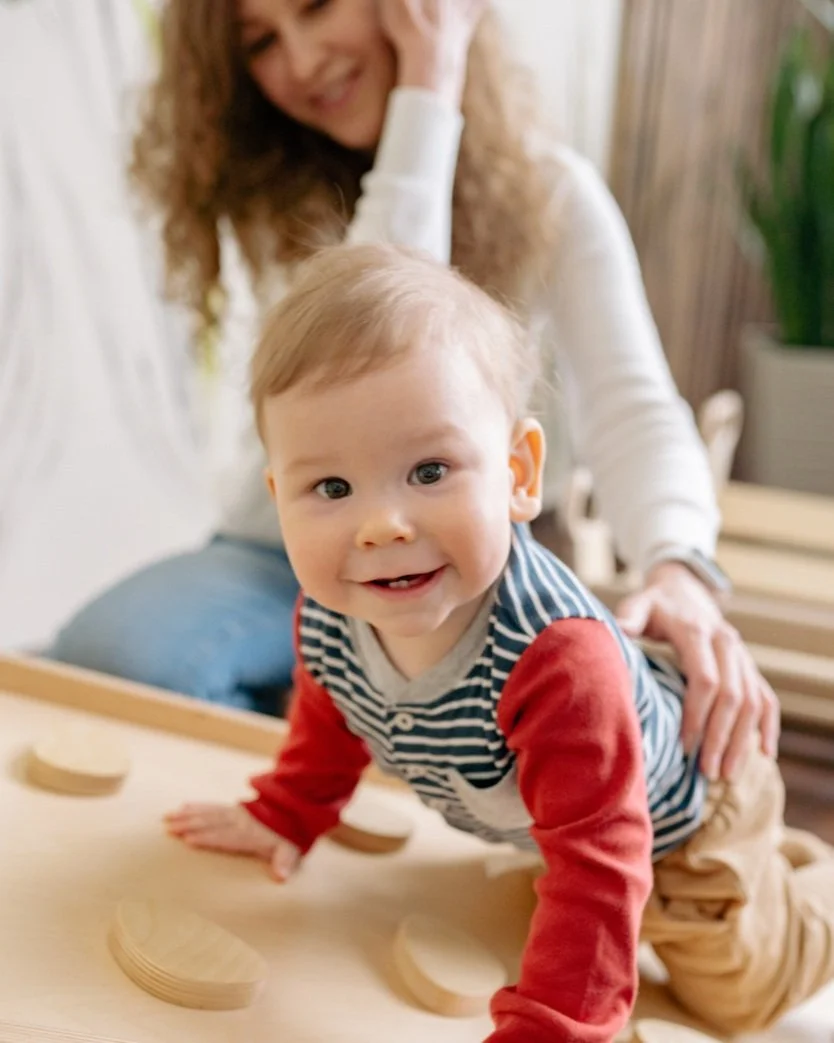image of young boy child climbing up a tower at babyspace coachella valley in palm desert, ca