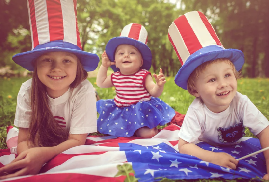 image of three siblings all dressed with July fourth clothing at babyspace Coachella valley in palm desert