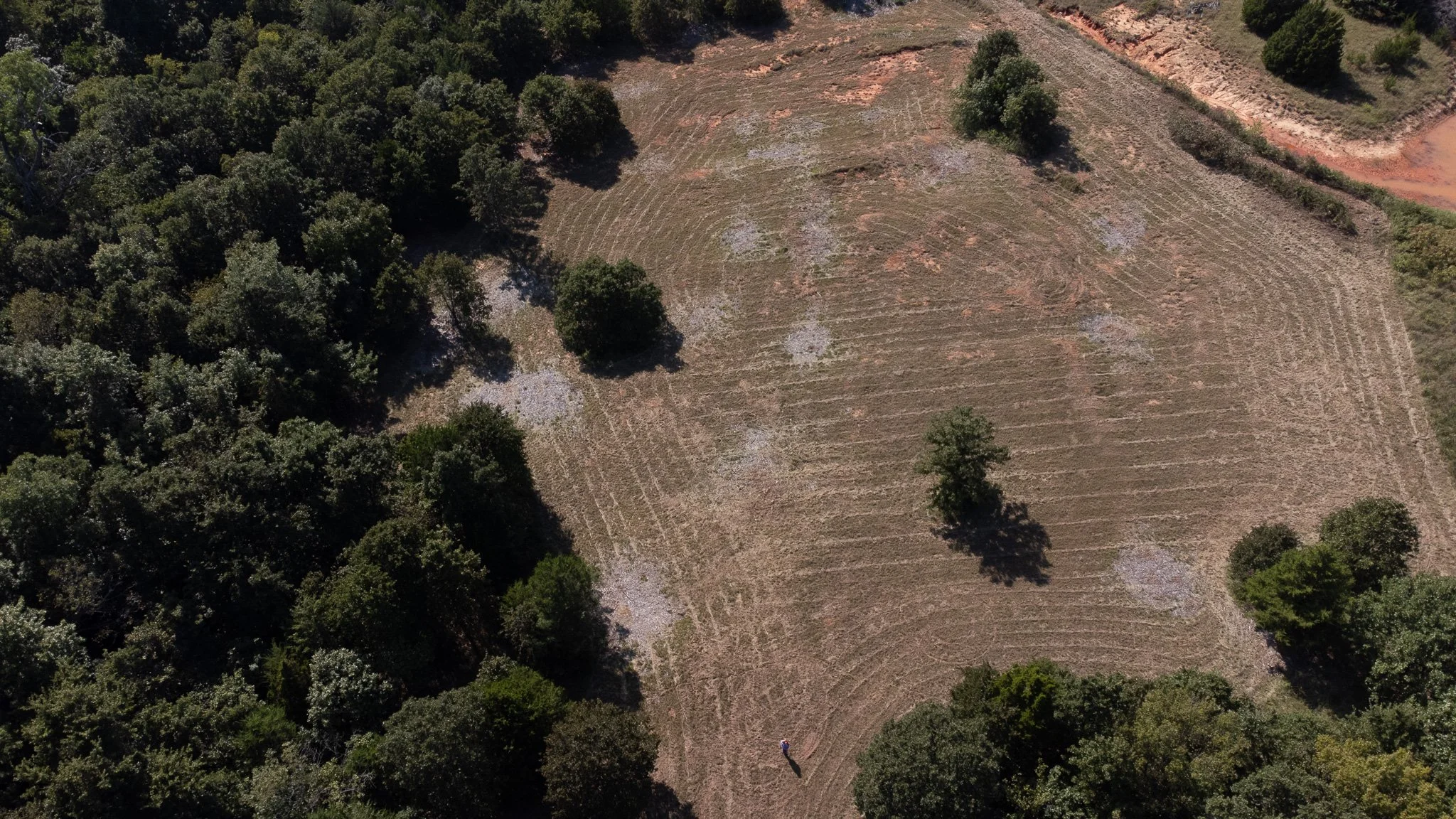 Mature wooded lot with home site to build on 10 acres in Jones Oklahoma.