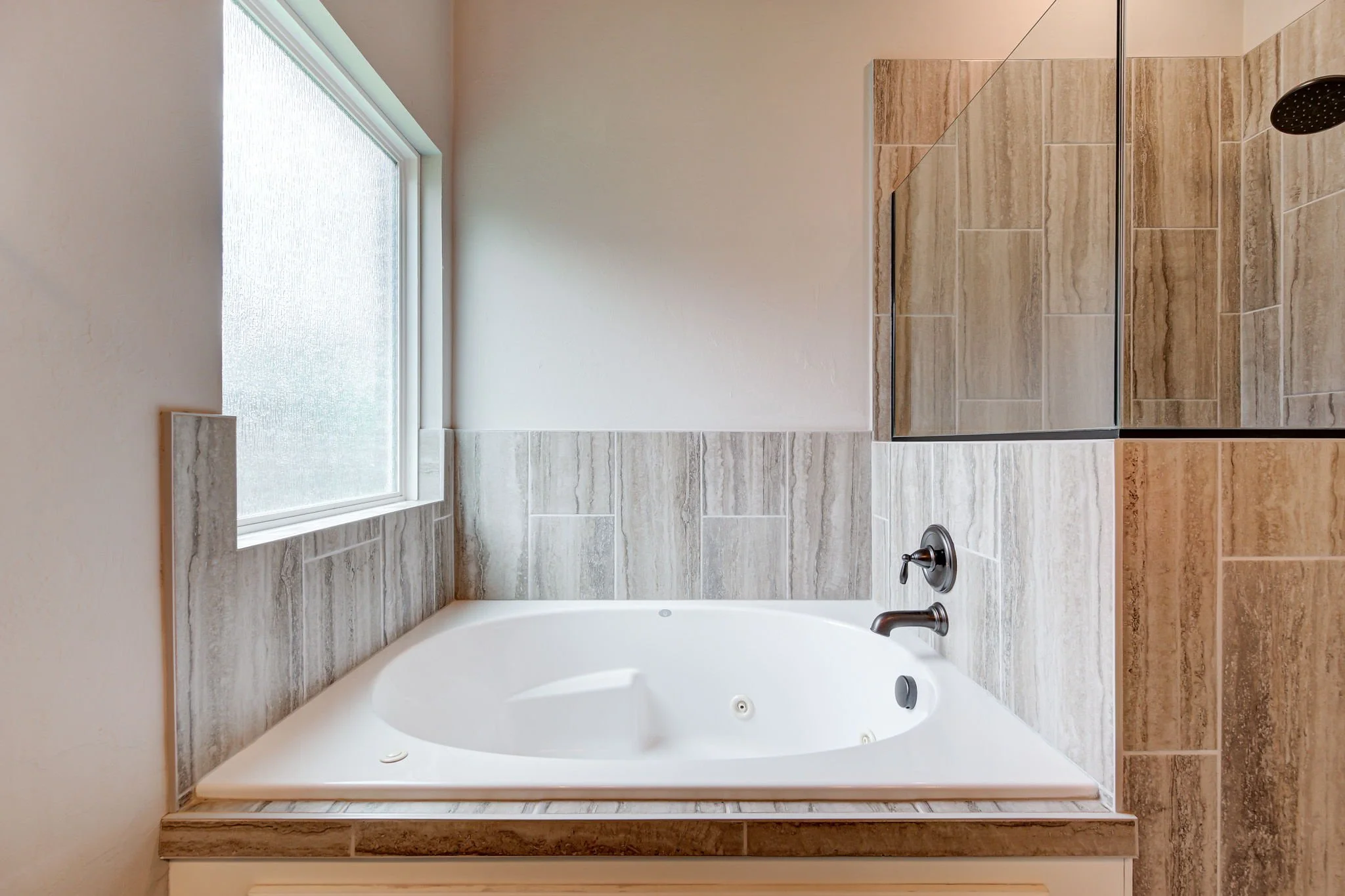 23-jetted-soaking-tub-tile-surround-master-bath.jpg
