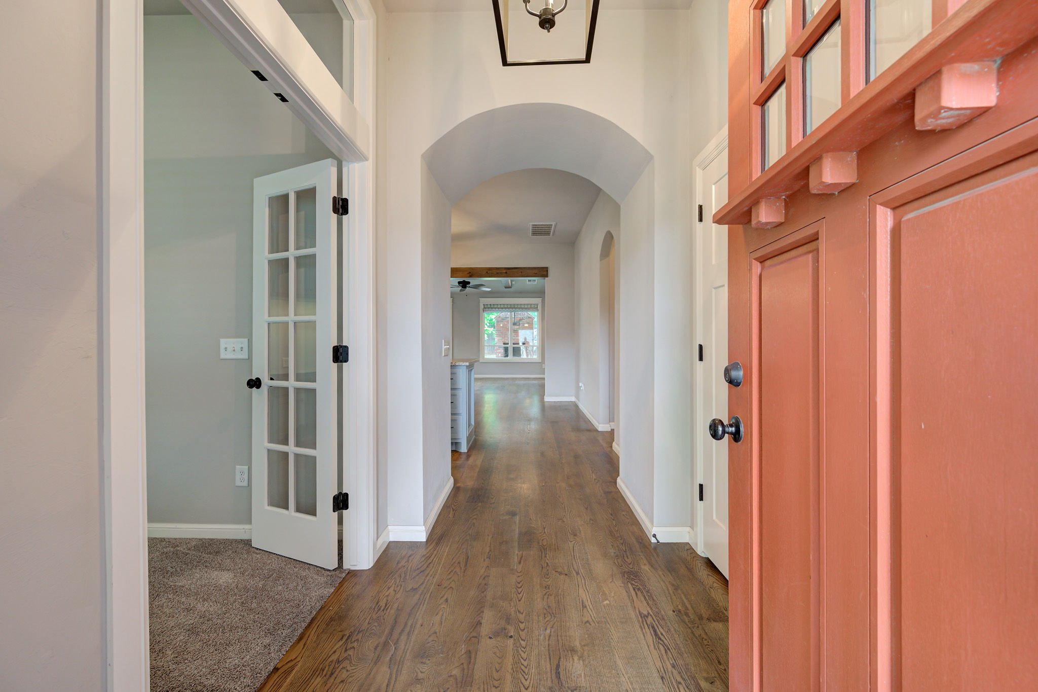 04-entryway-foyer-hardwood-floors-arched-ceiling.jpg