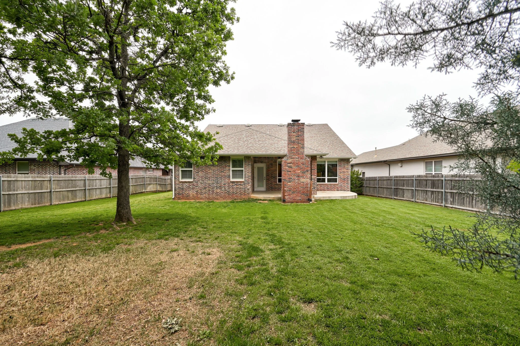 35-back-exterior-rear-elevation-mature-trees.jpg