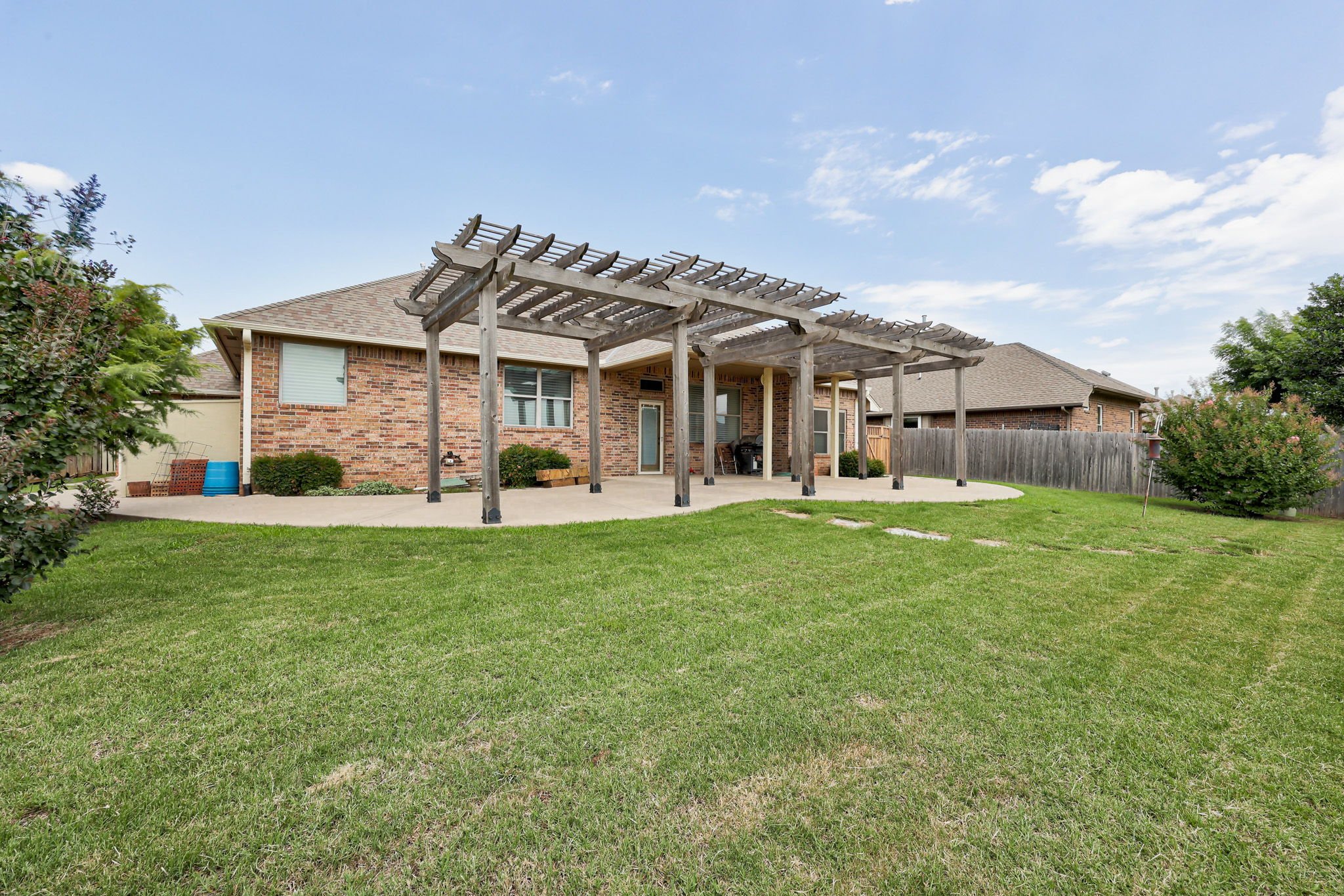 6601-chelsey-ln-oklahoma-city-ok-47-backyard-pergola-angle copy.jpg