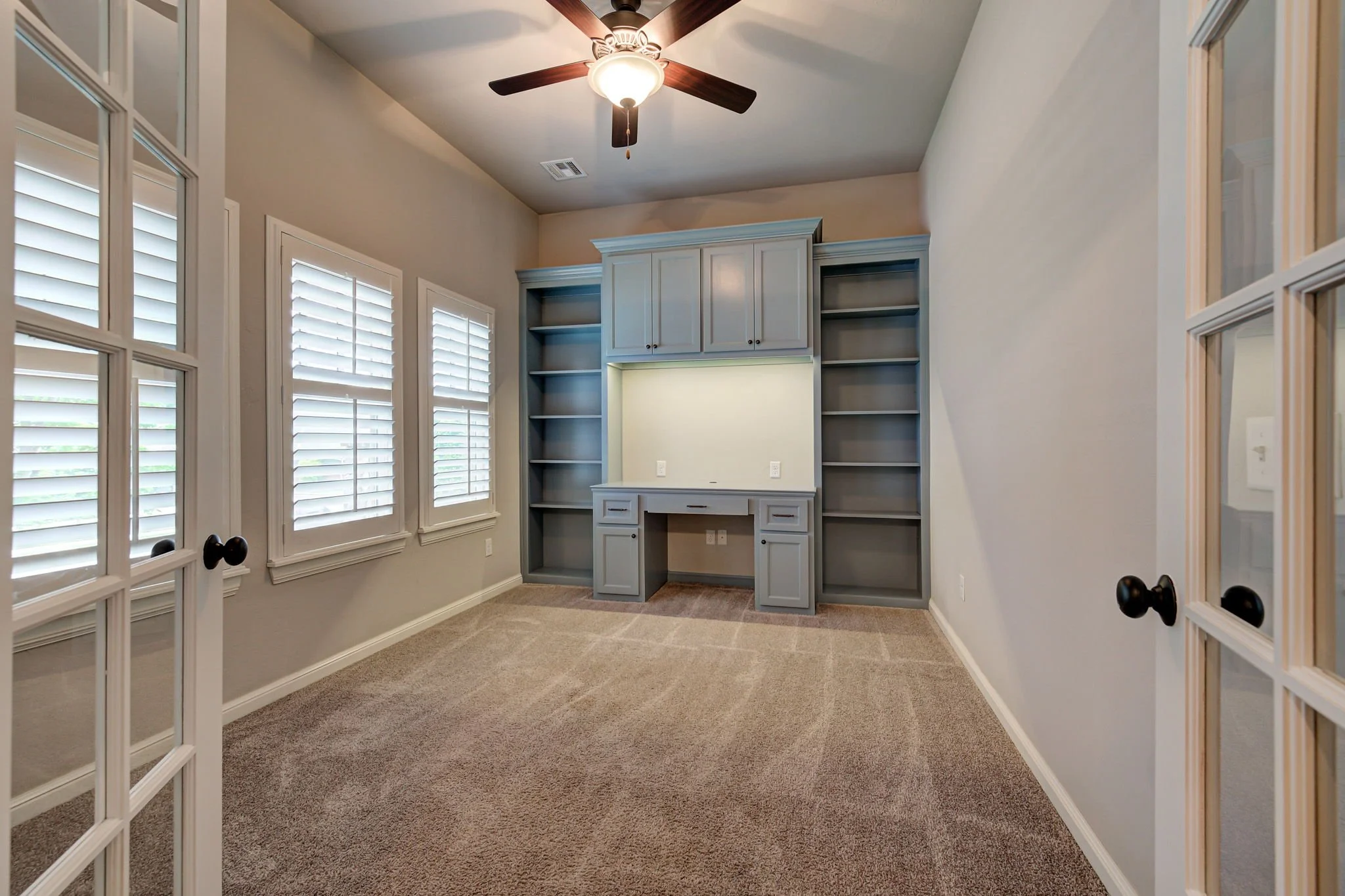 27-home-office-study-built-in-desk-shelves.jpg