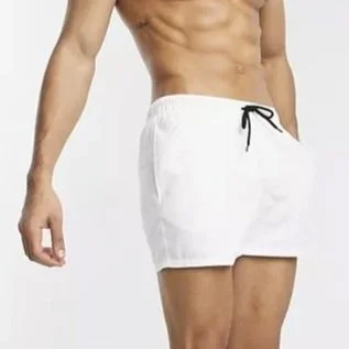 Close-up of a man's lower torso wearing white shorts with a black drawstring.