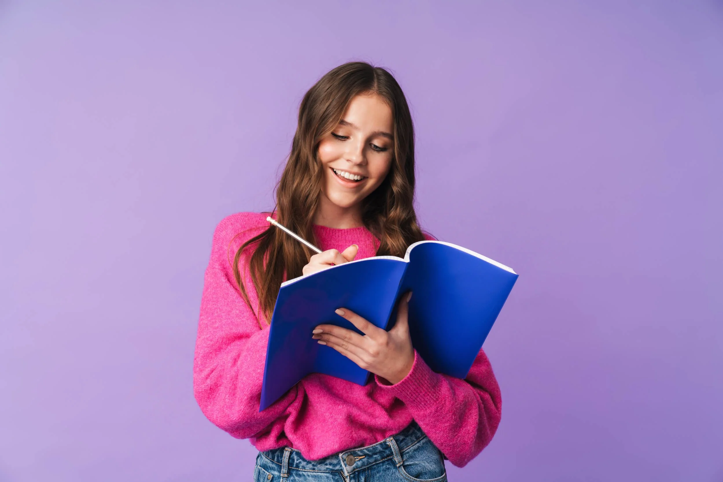 Middle School Student Taking Notes