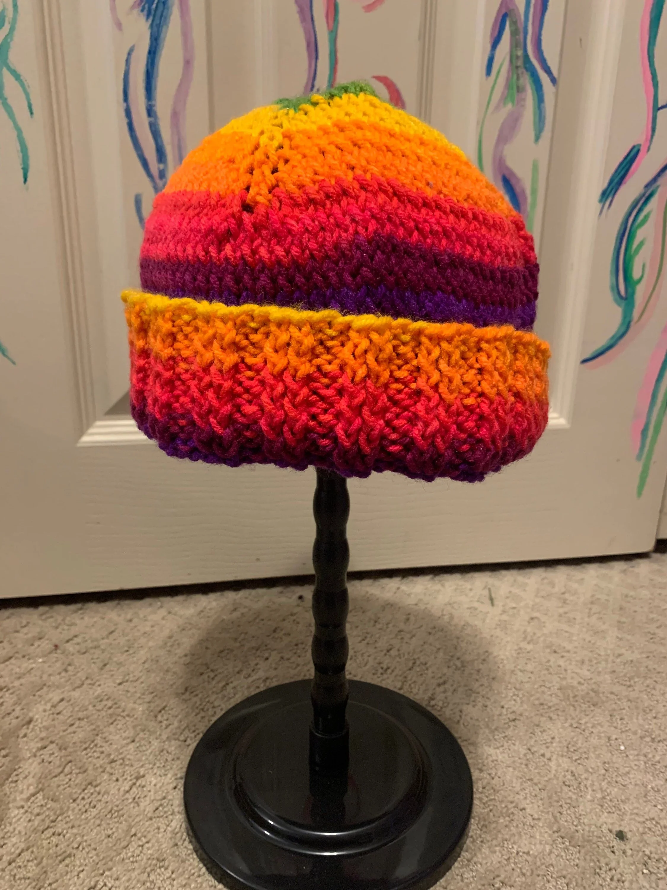 Rainbow+knitted+hat.webp