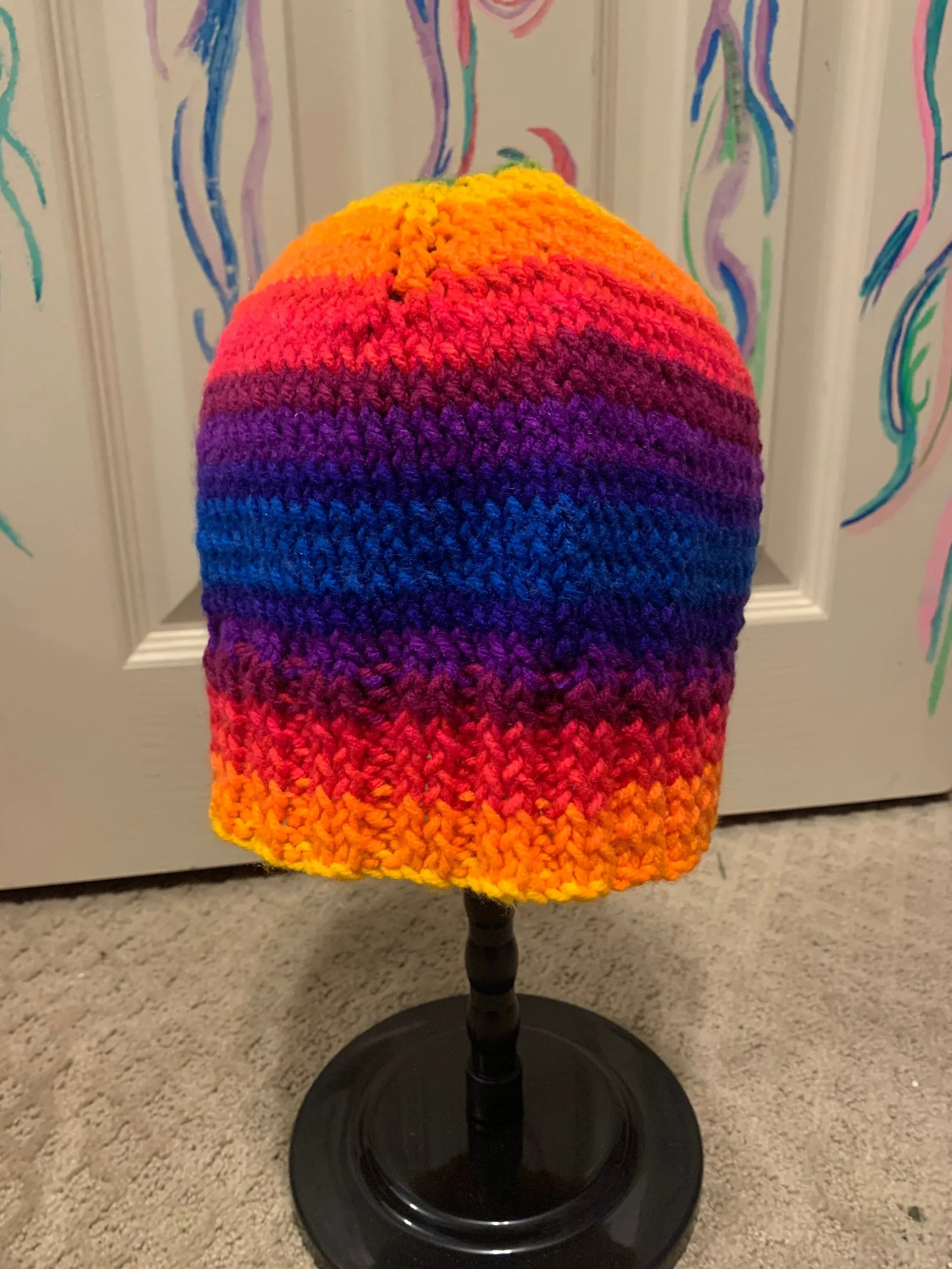 Rainbow+knitted+hat+open.webp
