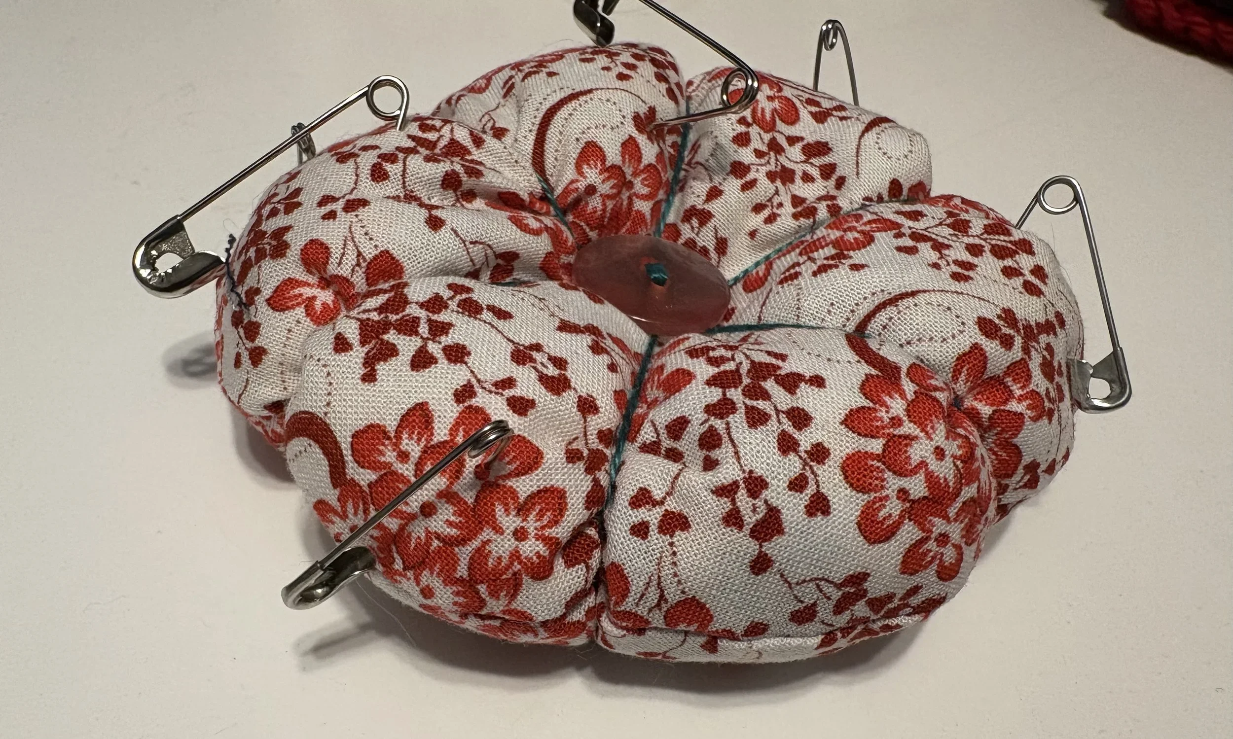 Round+pin+cushion+close-up.webp