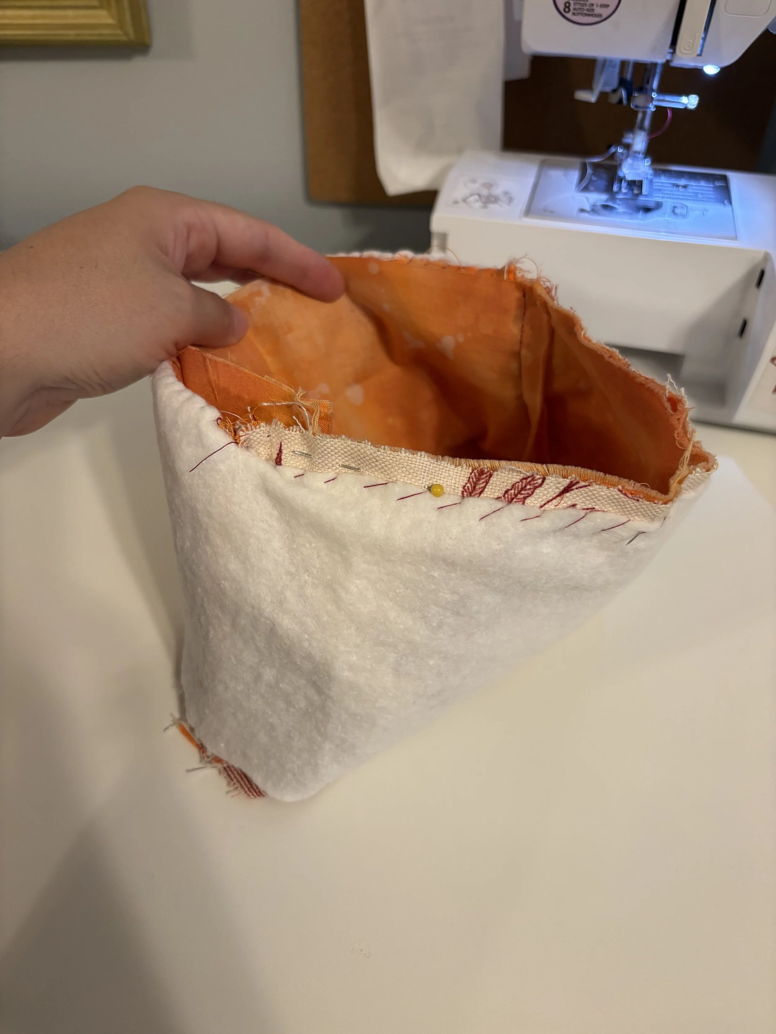 Padding via cotton batting 
("The pieces were feeling a little too loosey-goosey; these inserts gave them the structure they needed")