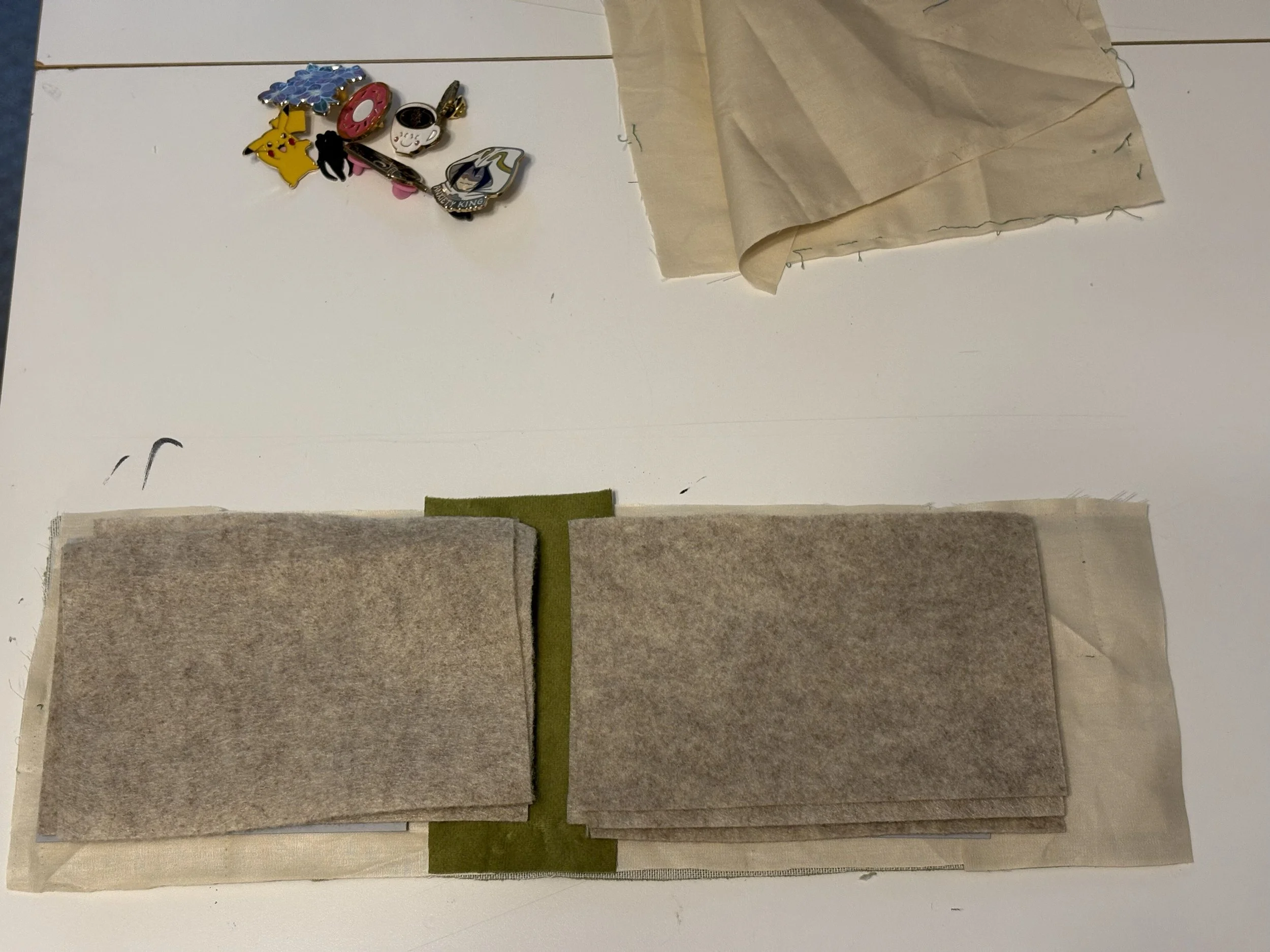 Book pieces measured, cut, and laid out in order