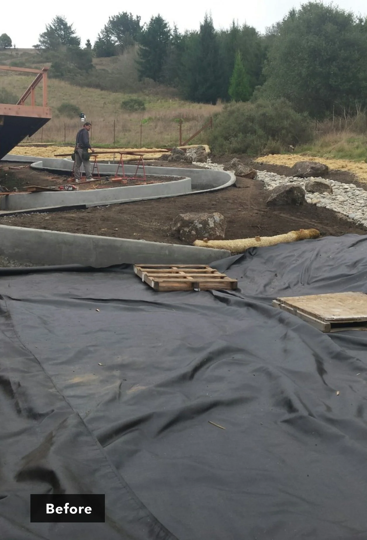 Mid construction of hillside ramp.
