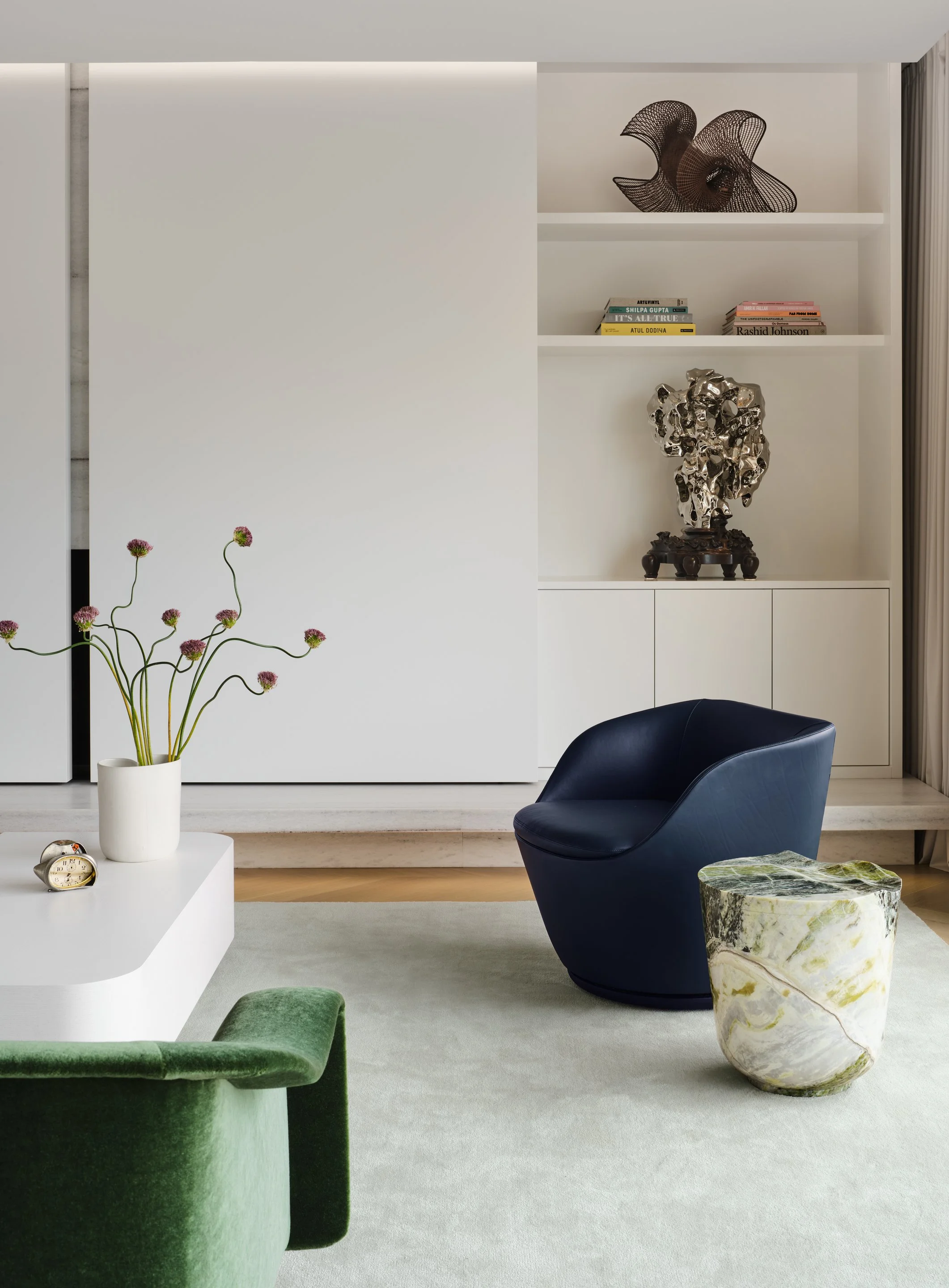Primary bedroom with moss green upholstered headboard wall, Fernando Mastroantonio ombre drum side table, and Asuka Anastacia Ogawa black and white portrait photograph — Russian Hill San Francisco interior design by Studio Collins Weir