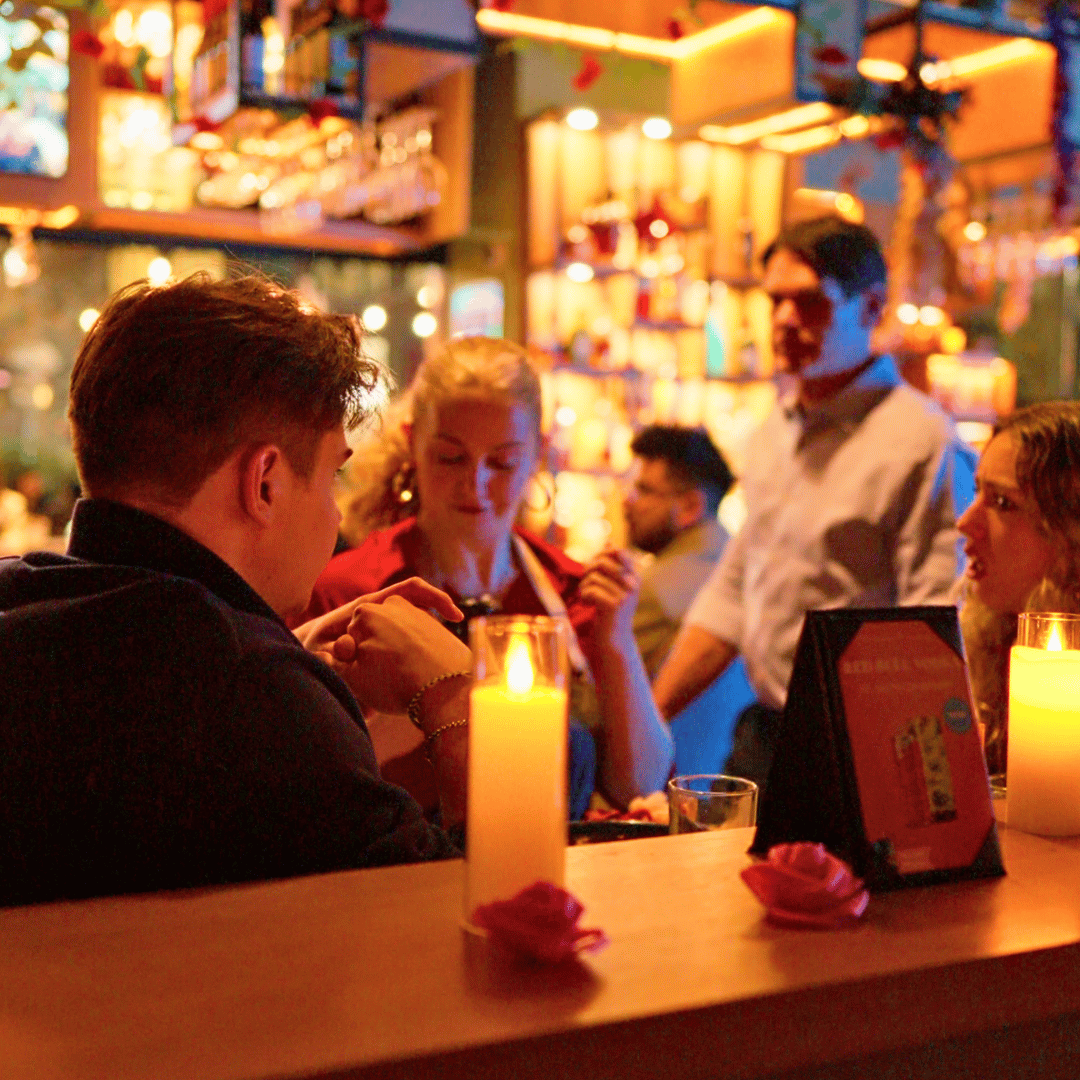 candlelit table guests.png