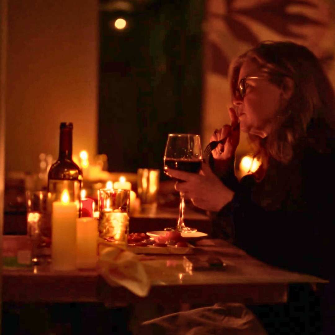 woman candlelit dining buena vida