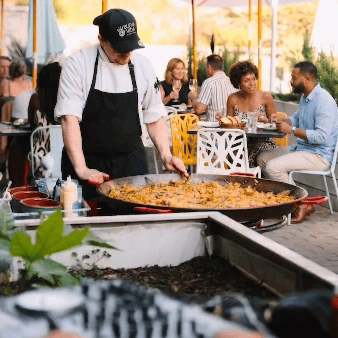 giant paella with chef on buena vida patio