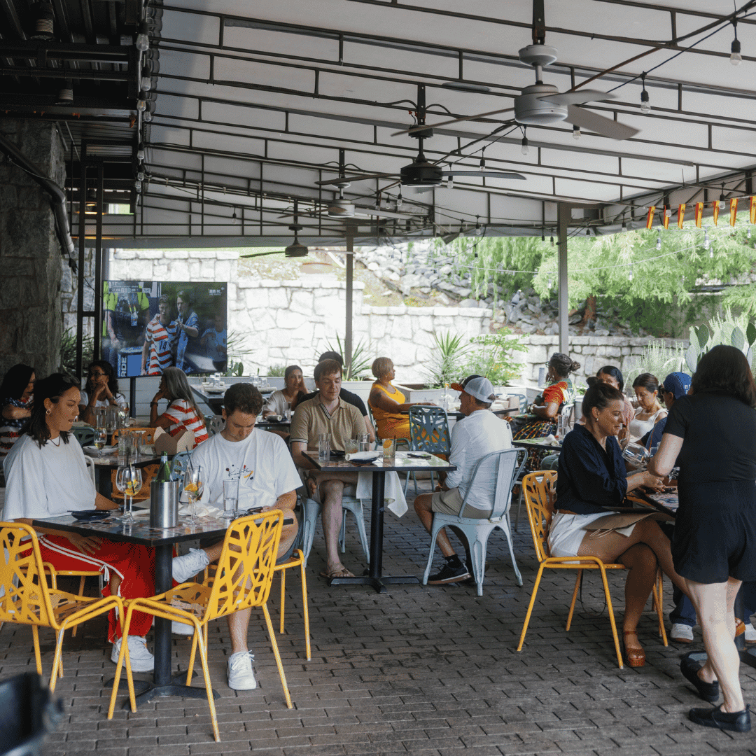 Buena Vida patio with guests