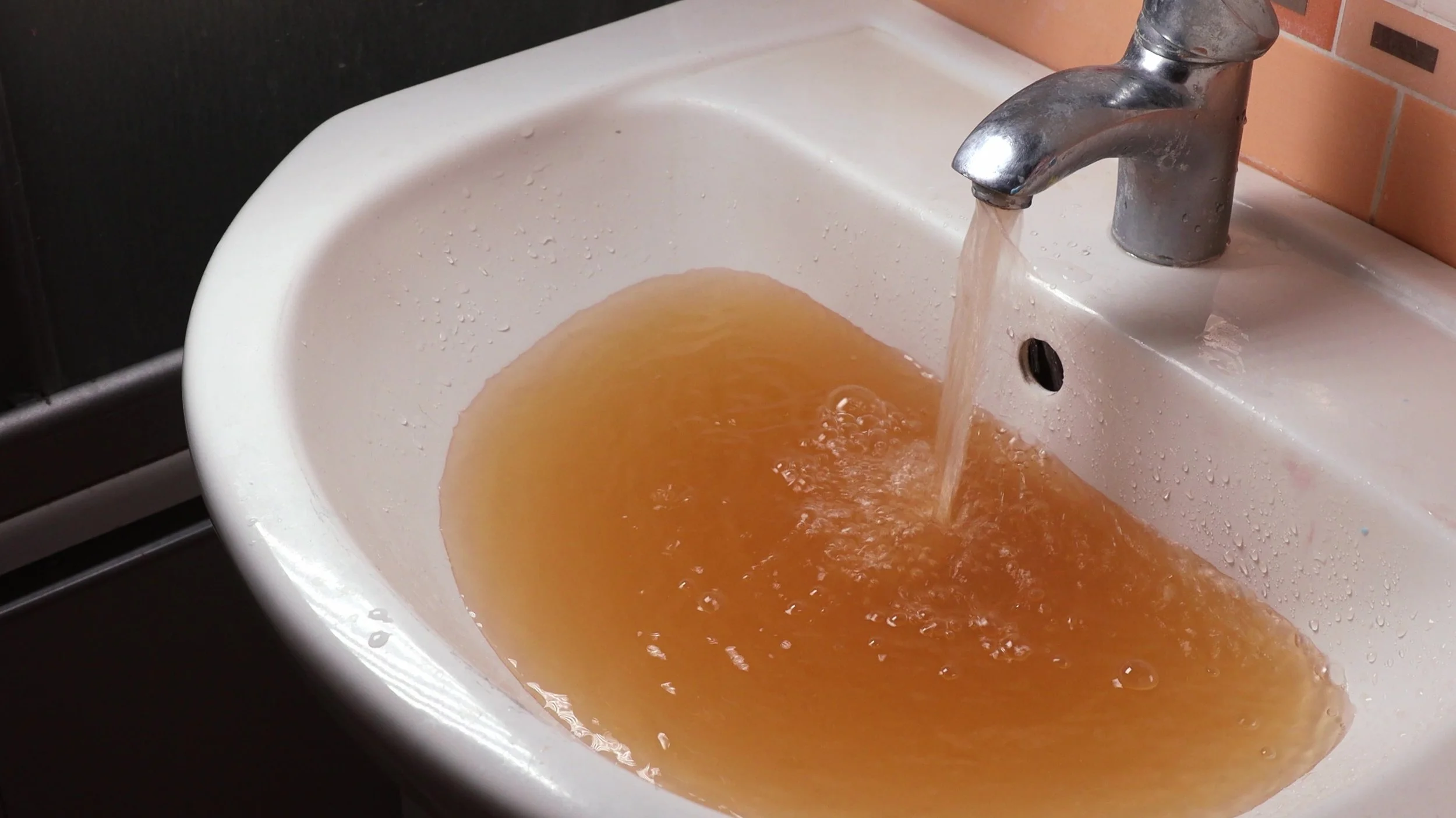 Why Is My Water Brown or Rusty in an Older Home? Causes, Risks &amp; When to Repipe