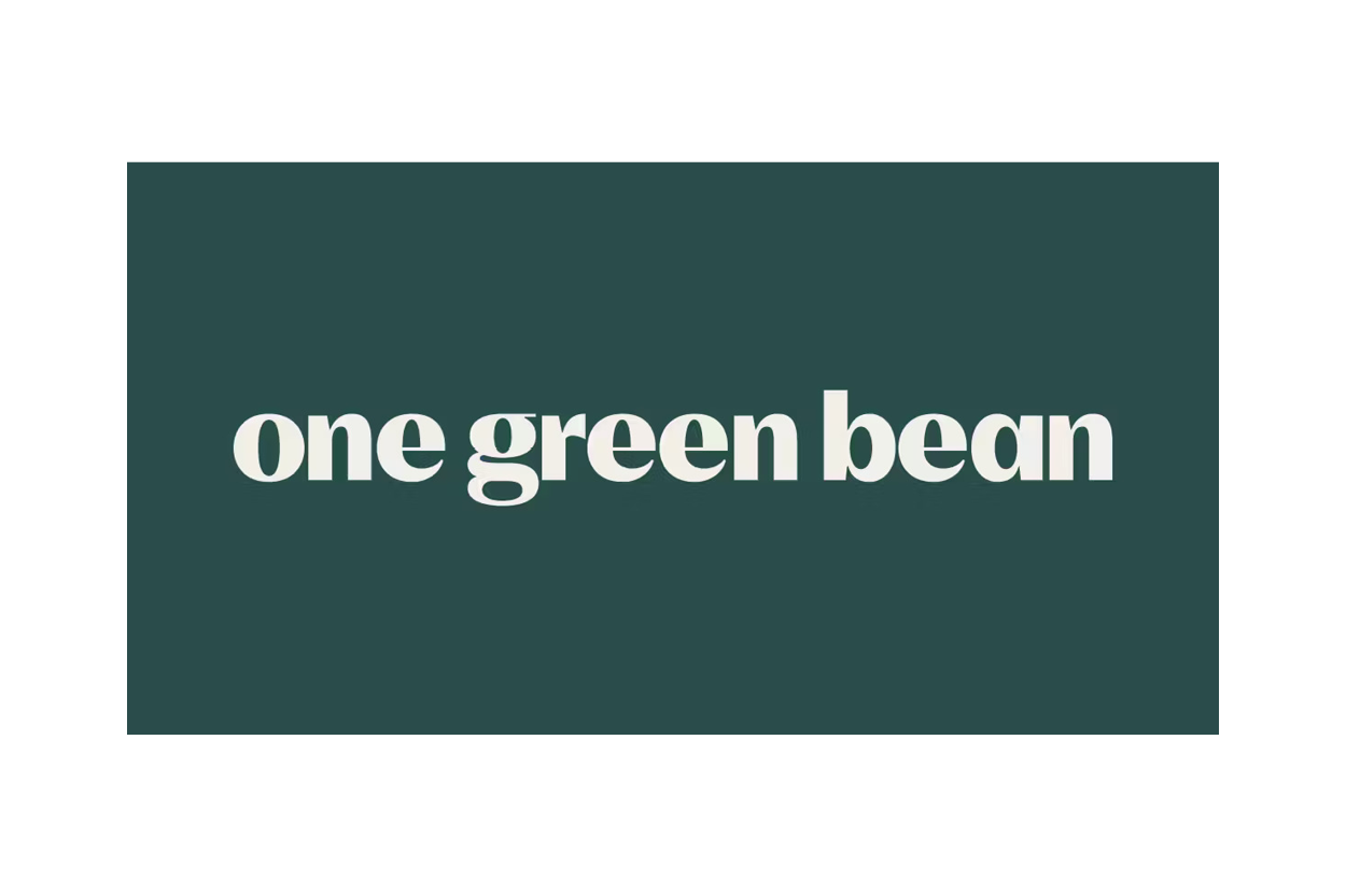 Text reading 'one green bean' on a dark teal background.