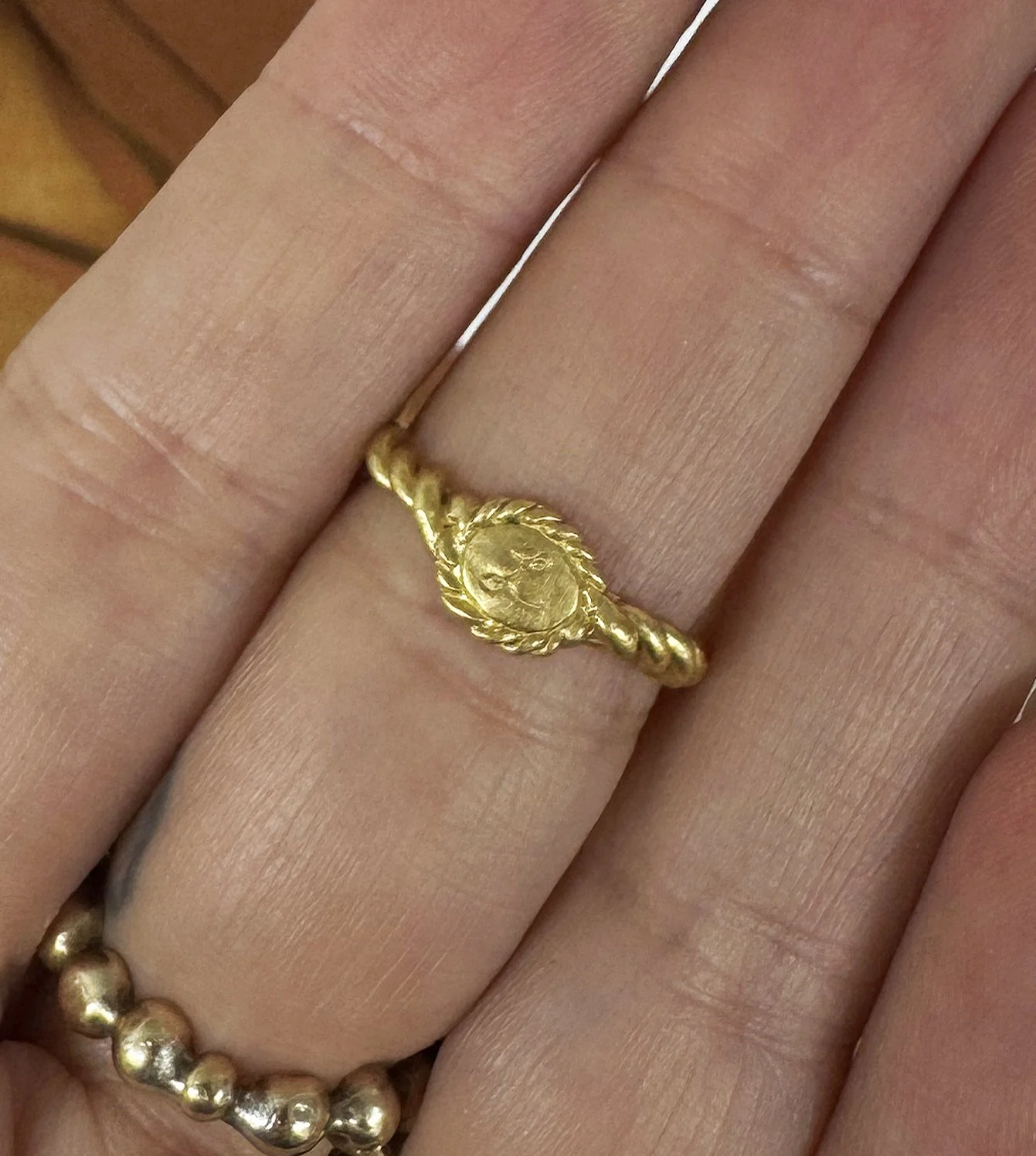 Lara’s Buckle Ring - 22k gold buckle ring with L engraving