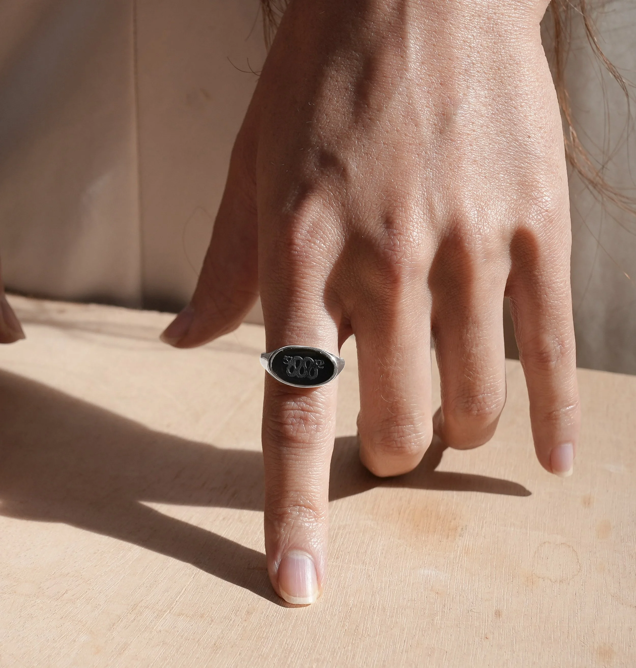The Sello Ring with Obsidian in Silver.jpg