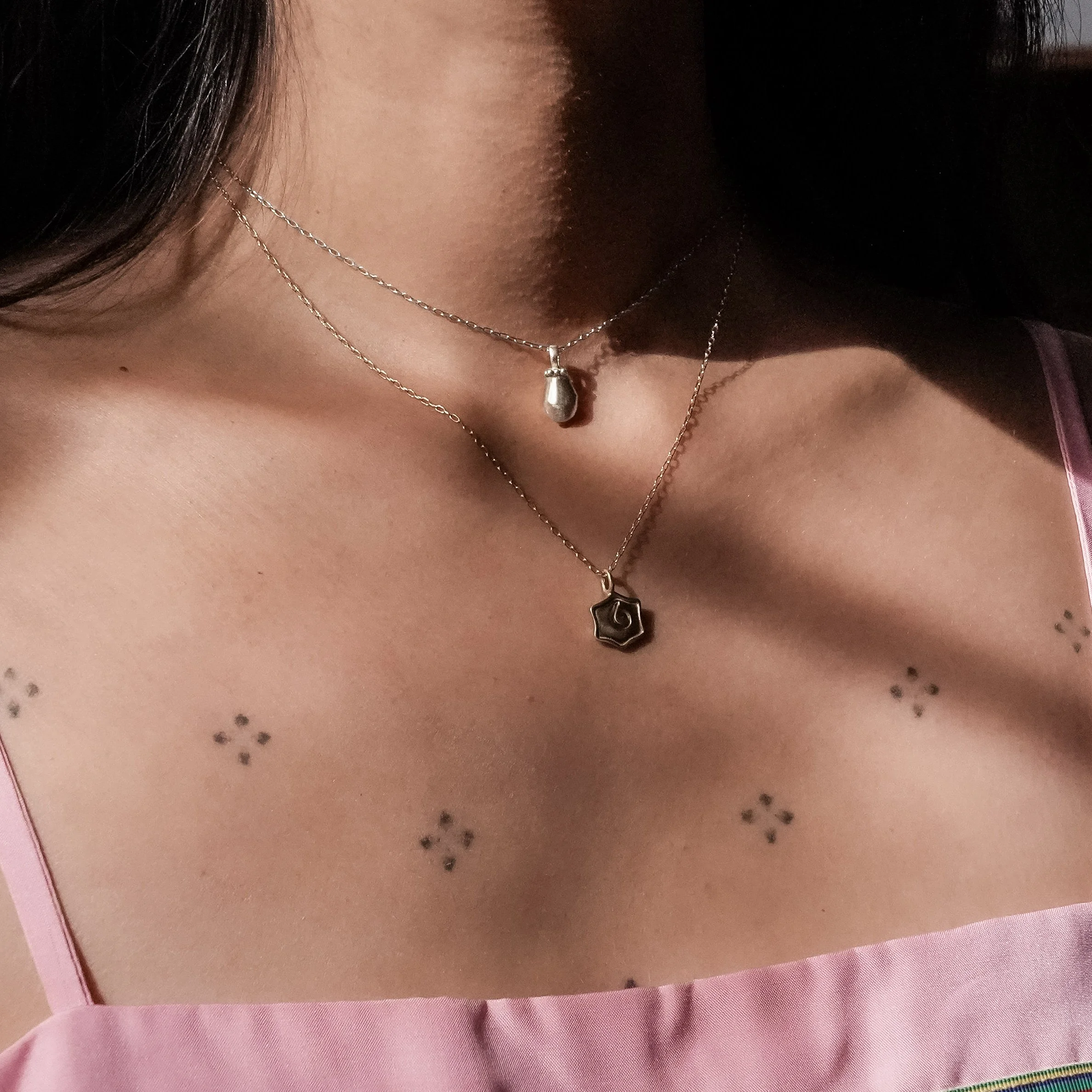 The Cascabel Necklace in Silver.jpg