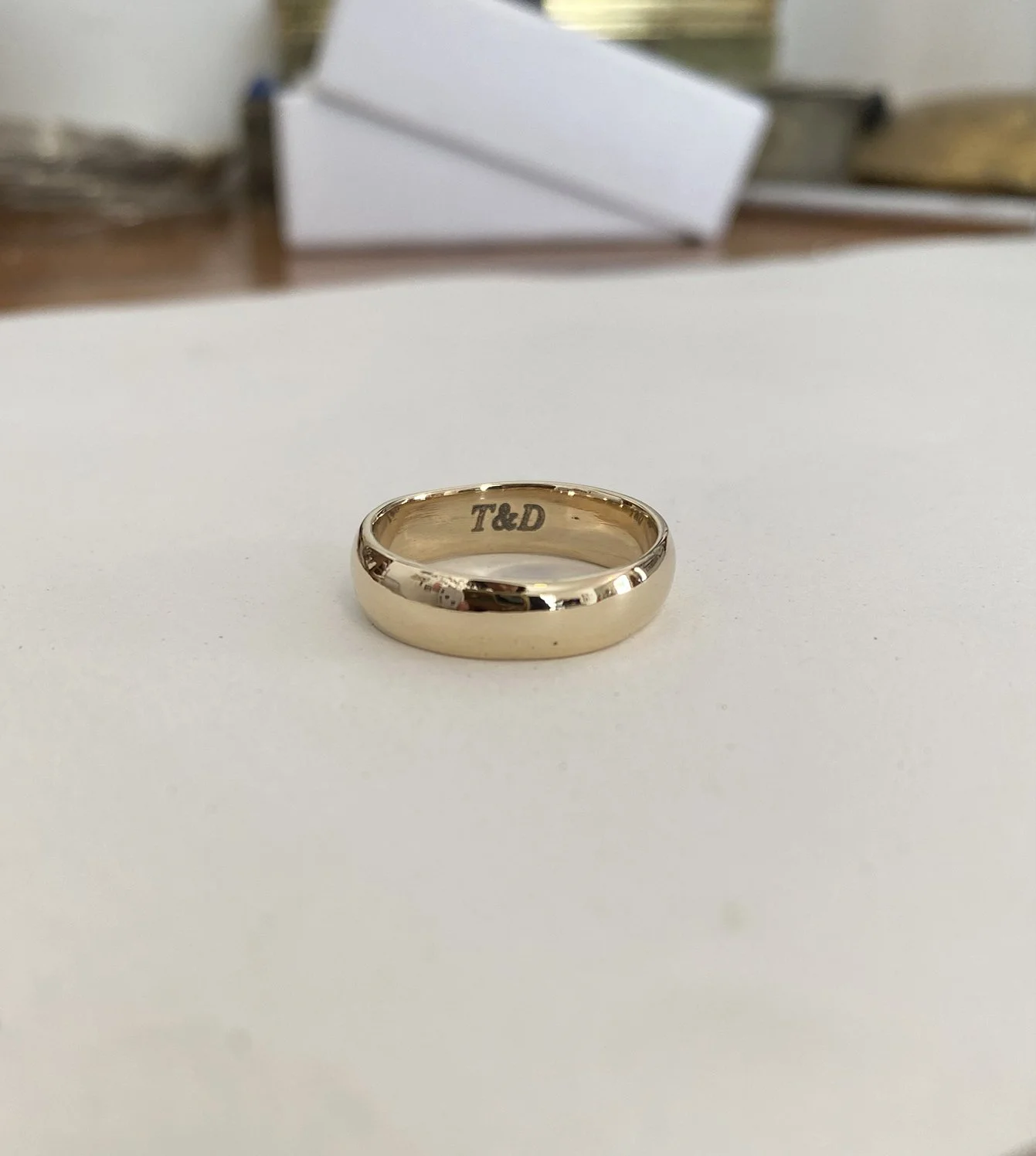 Tatiana’s Wedding Band - 14k gold ring engraved and made using the customer's repurposed old gold jewelry
