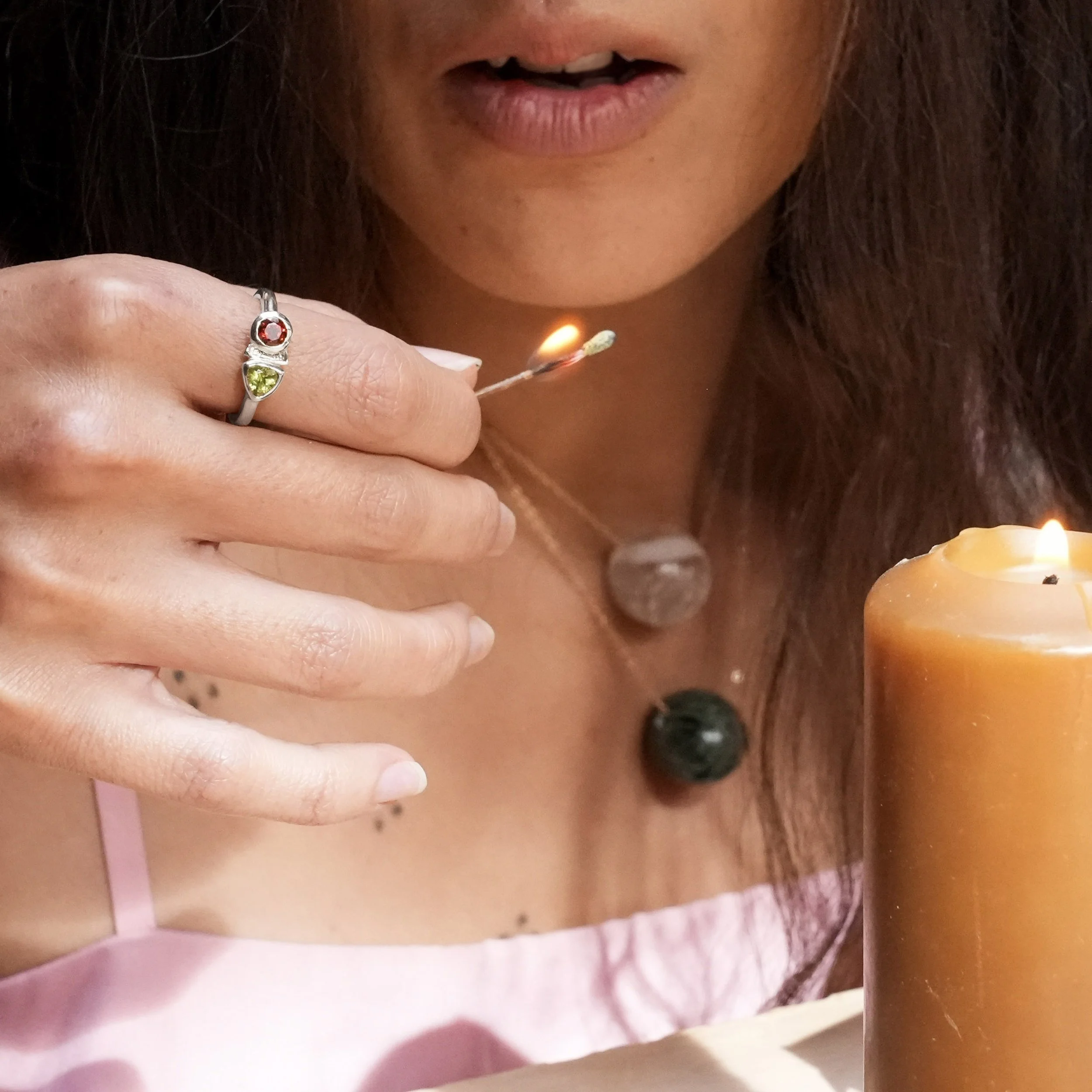 The Ofrenda Ring with Garnet and Peridot in Silver.jpg