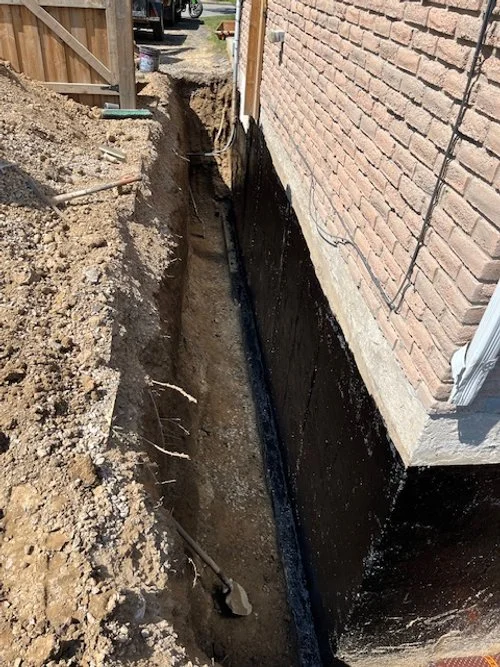 Exterior - Tar on Wall 3.jpg