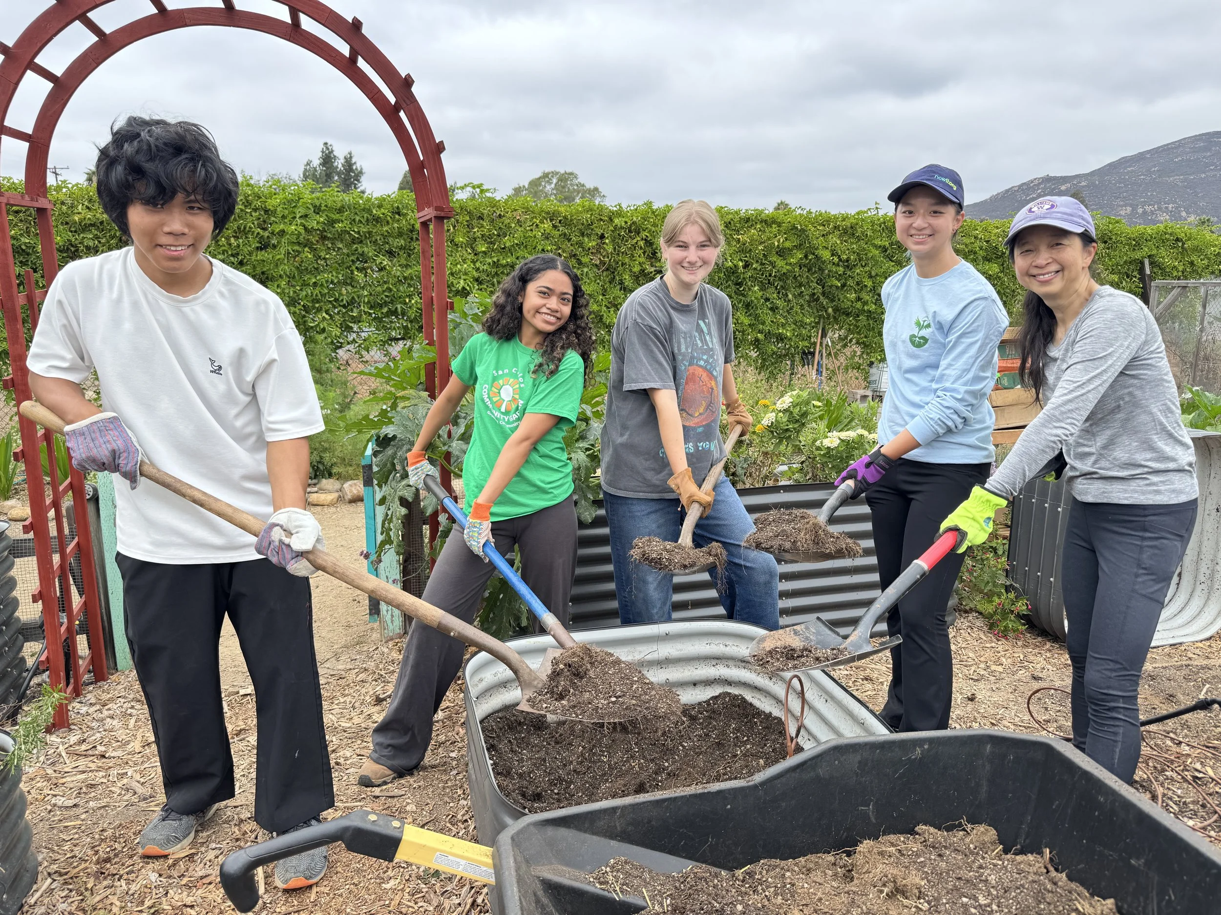 Volunteers helping build a new sensory garden. 9/13/25