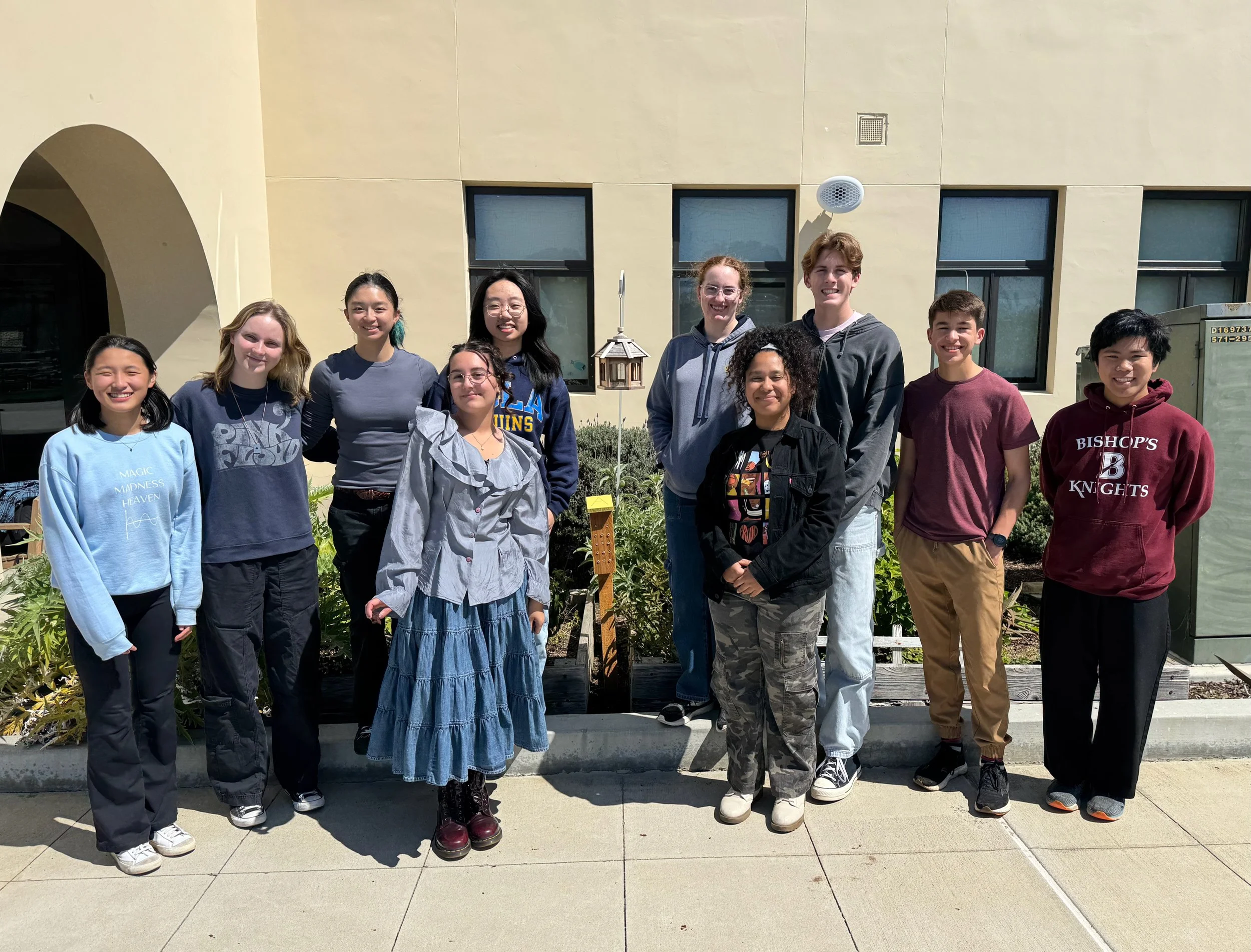 Club picture with the mason bee house at the Bishop's pollinator garden! 3/20/25