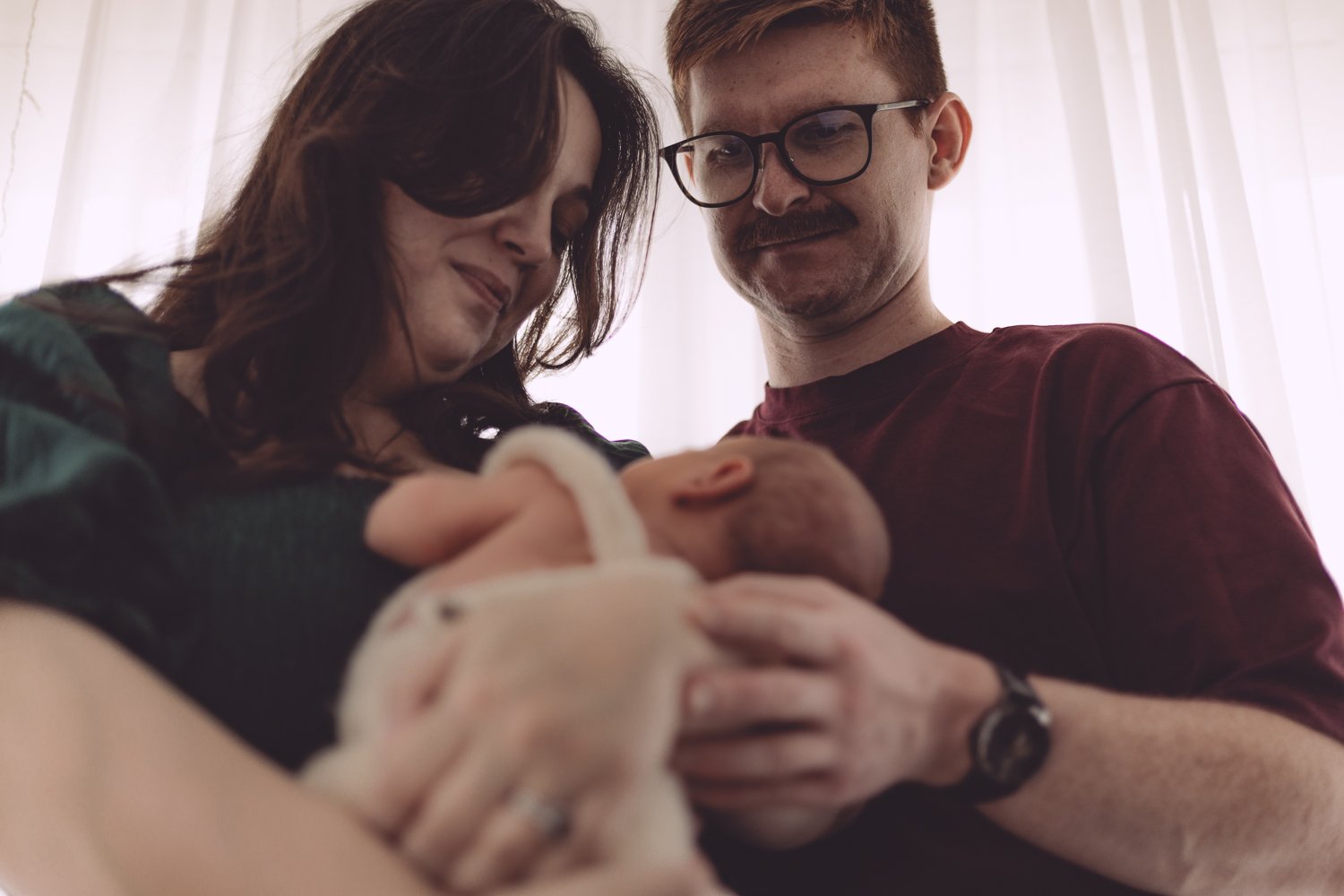 Nicole Johnson Photography ~ Newborn Session, Parents embracing child