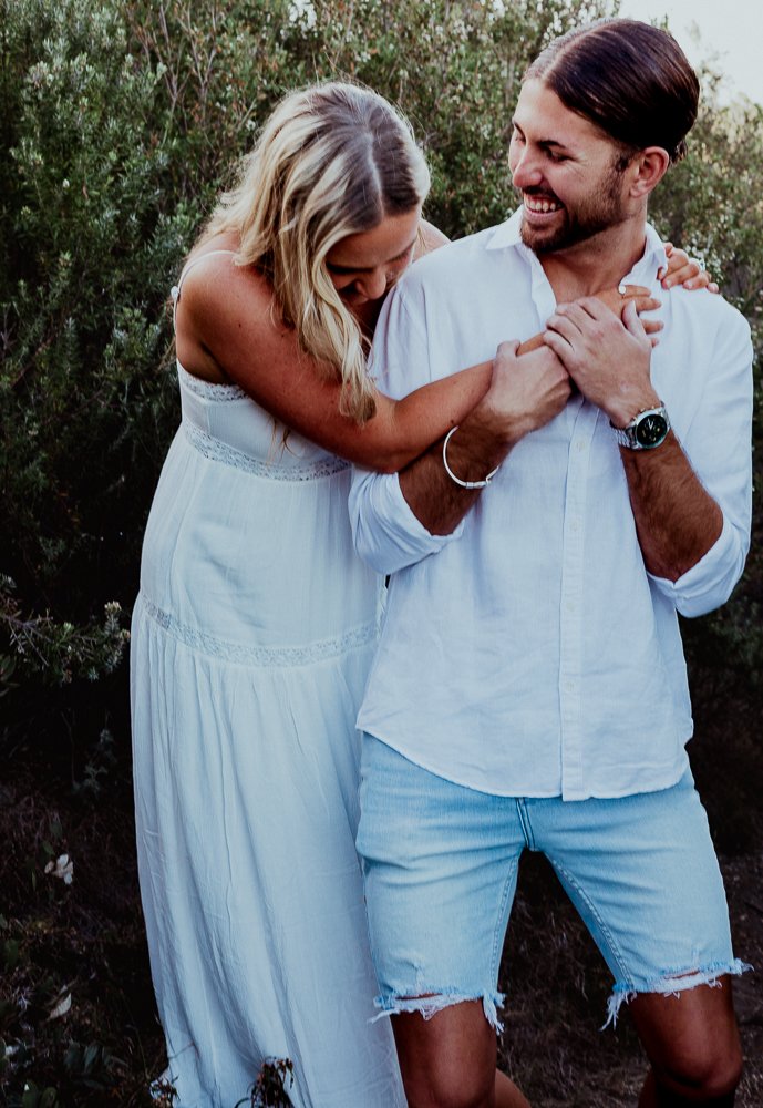 Nicole Johnson Photography ~ Couple session, couple laughing whilst embracing