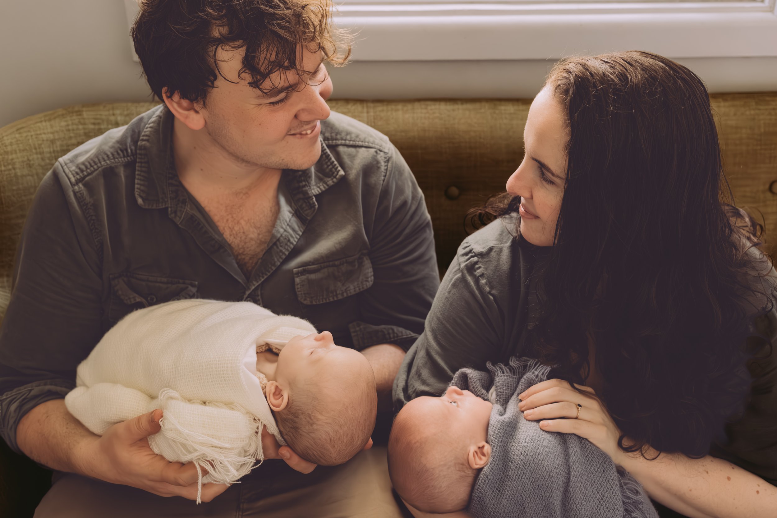 Nicole Johnson Photography ~ Newborn Session, Parents each holding child whilst looking at each other