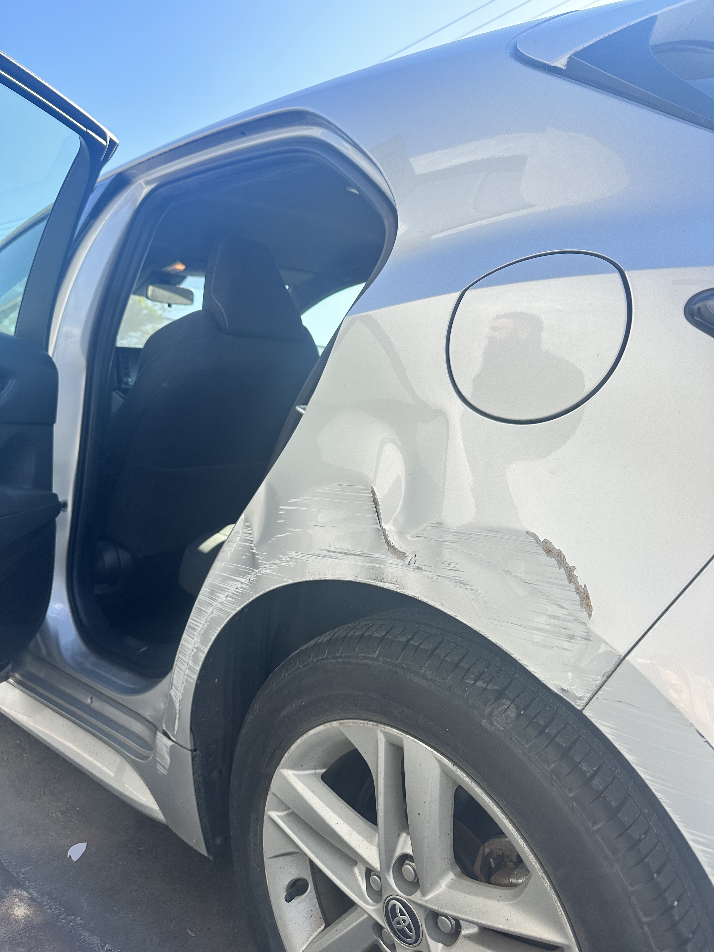 Assessing accident damage.